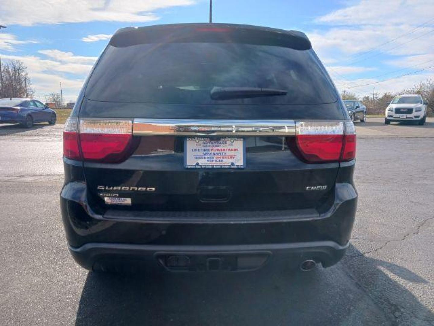 2013 Brilliant Black Crystal Pearl Dodge Durango Crew AWD (1C4RDJDG9DC) with an 3.6L V6 DOHC 24V engine, 5-Speed Automatic transmission, located at 1230 East Main St, Xenia, OH, 45385, (937) 908-9800, 39.687321, -83.910294 - Photo#5