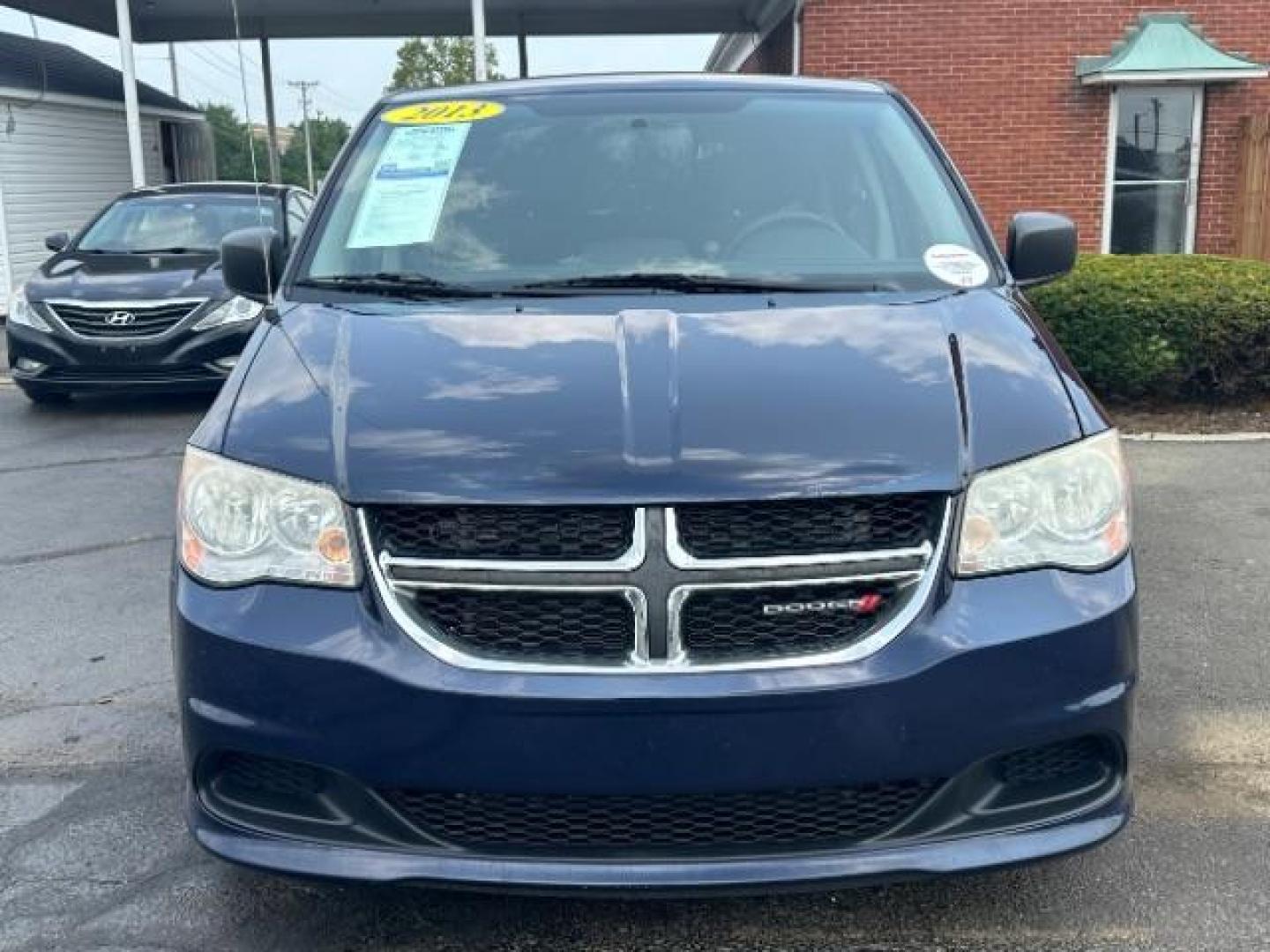 2013 Blue Streak Pearl Dodge Grand Caravan SE (2C4RDGBG1DR) with an 3.6L V6 DOHC 24V engine, 6-Speed Automatic transmission, located at 401 Woodman Dr, Riverside, OH, 45431, (937) 908-9800, 39.763779, -84.122063 - Photo#1