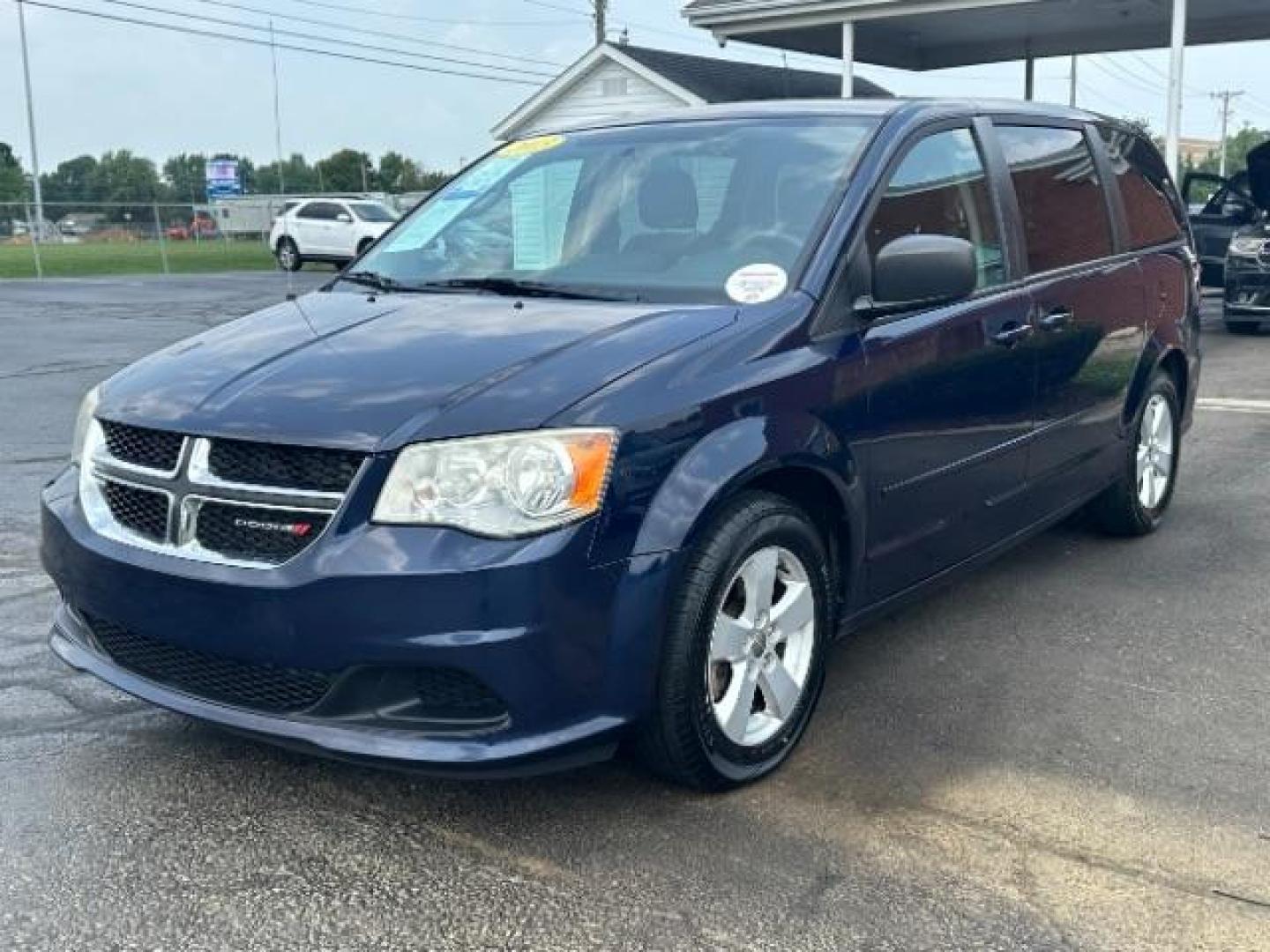 2013 Blue Streak Pearl Dodge Grand Caravan SE (2C4RDGBG1DR) with an 3.6L V6 DOHC 24V engine, 6-Speed Automatic transmission, located at 401 Woodman Dr, Riverside, OH, 45431, (937) 908-9800, 39.763779, -84.122063 - Photo#2