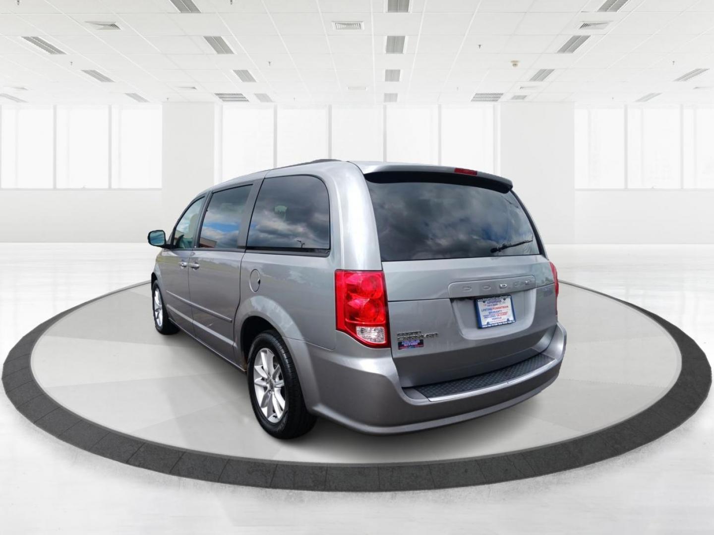 2013 Maximum Steel Metallic Dodge Grand Caravan SXT (2C4RDGCGXDR) with an 3.6L V6 DOHC 24V engine, 6-Speed Automatic transmission, located at 1230 East Main St, Xenia, OH, 45385, (937) 908-9800, 39.687321, -83.910294 - Photo#4