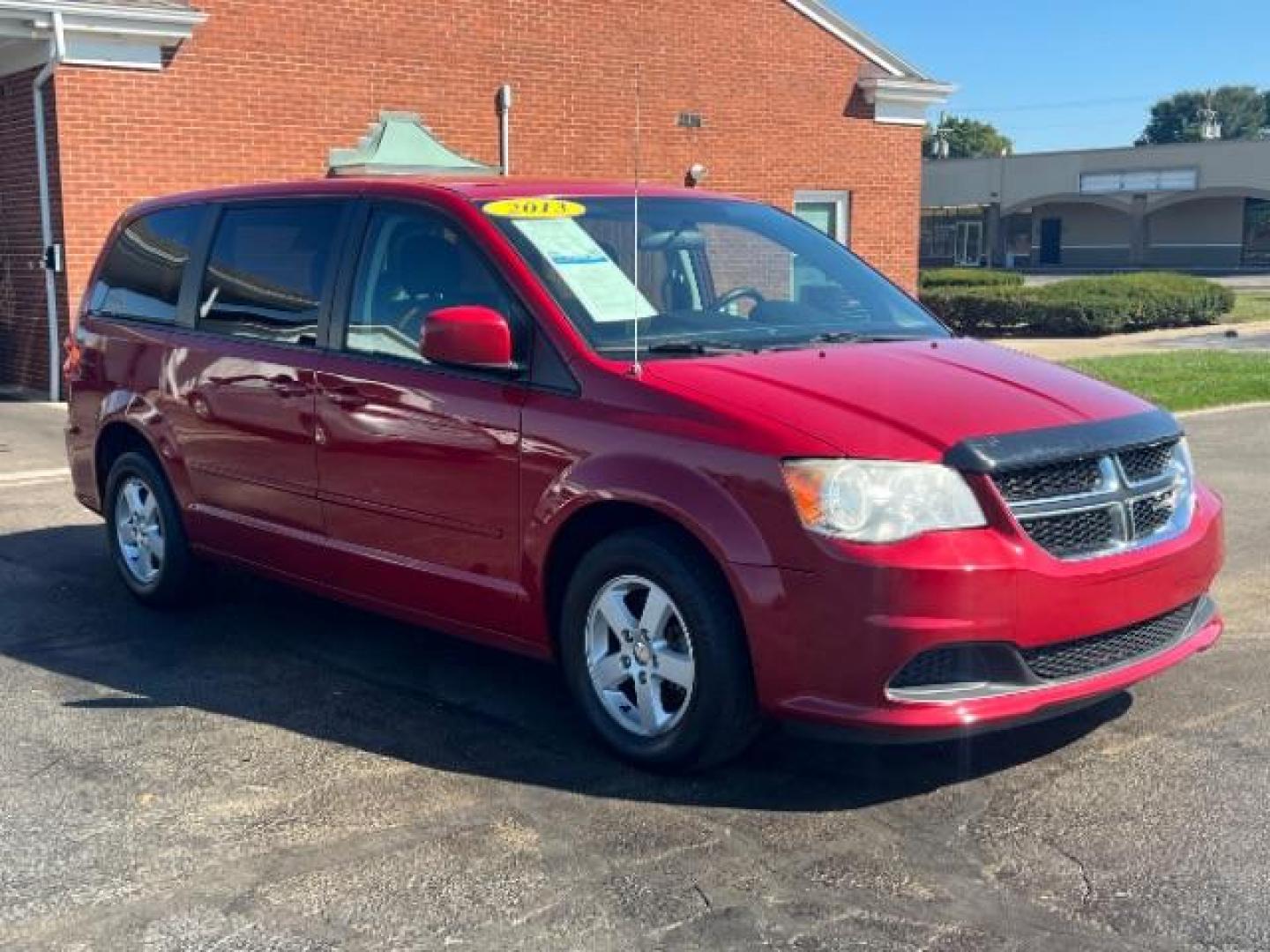 2013 Redline 2 Coat Pearl Dodge Grand Caravan SXT (2C4RDGCG1DR) with an 3.6L V6 DOHC 24V engine, 6-Speed Automatic transmission, located at 1230 East Main St, Xenia, OH, 45385, (937) 908-9800, 39.687321, -83.910294 - Photo#0