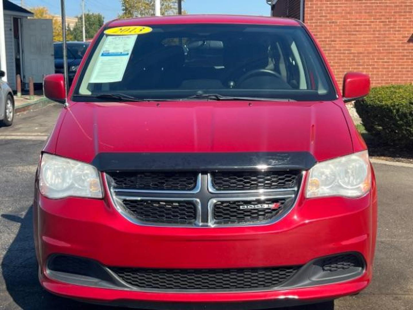 2013 Redline 2 Coat Pearl Dodge Grand Caravan SXT (2C4RDGCG1DR) with an 3.6L V6 DOHC 24V engine, 6-Speed Automatic transmission, located at 1230 East Main St, Xenia, OH, 45385, (937) 908-9800, 39.687321, -83.910294 - Photo#1