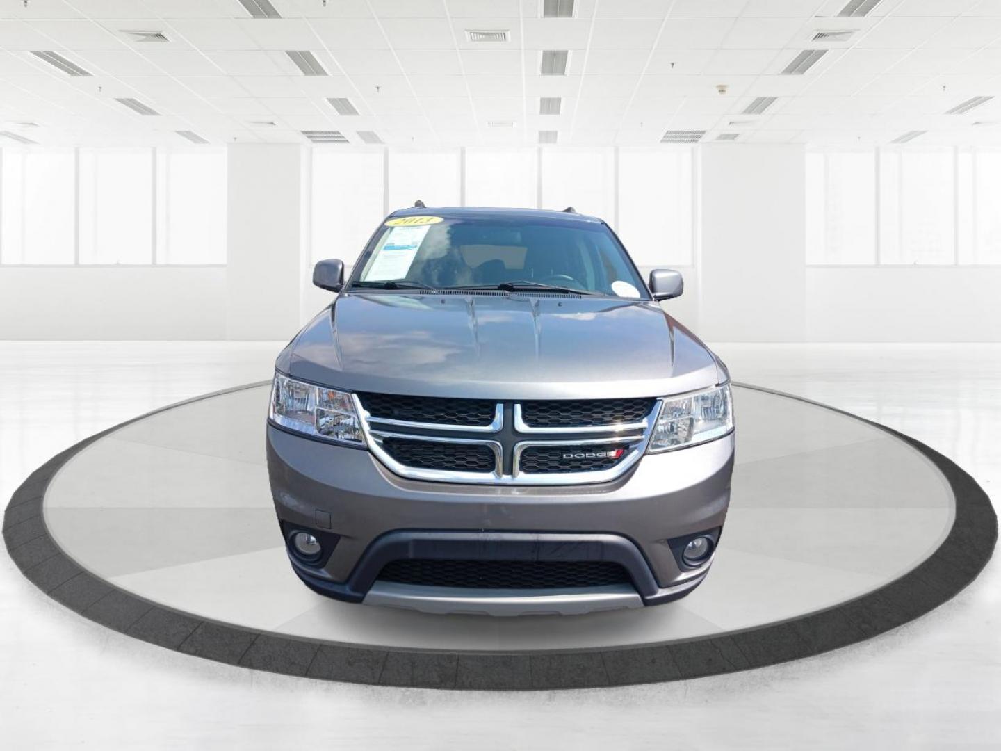 2013 Storm Grey Pearl Dodge Journey SXT (3C4PDCBB2DT) with an 2.4L L6 DOHC 16V engine, 4-Speed Automatic transmission, located at 1951 S Dayton Lakeview Rd., New Carlisle, OH, 45344, (937) 908-9800, 39.890999, -84.050255 - Photo#6