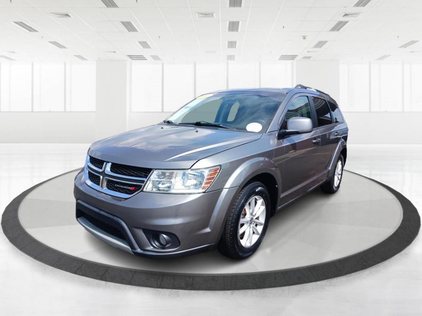 2013 Storm Grey Pearl Dodge Journey SXT (3C4PDCBB2DT) with an 2.4L L6 DOHC 16V engine, 4-Speed Automatic transmission, located at 1951 S Dayton Lakeview Rd., New Carlisle, OH, 45344, (937) 908-9800, 39.890999, -84.050255 - Photo#7