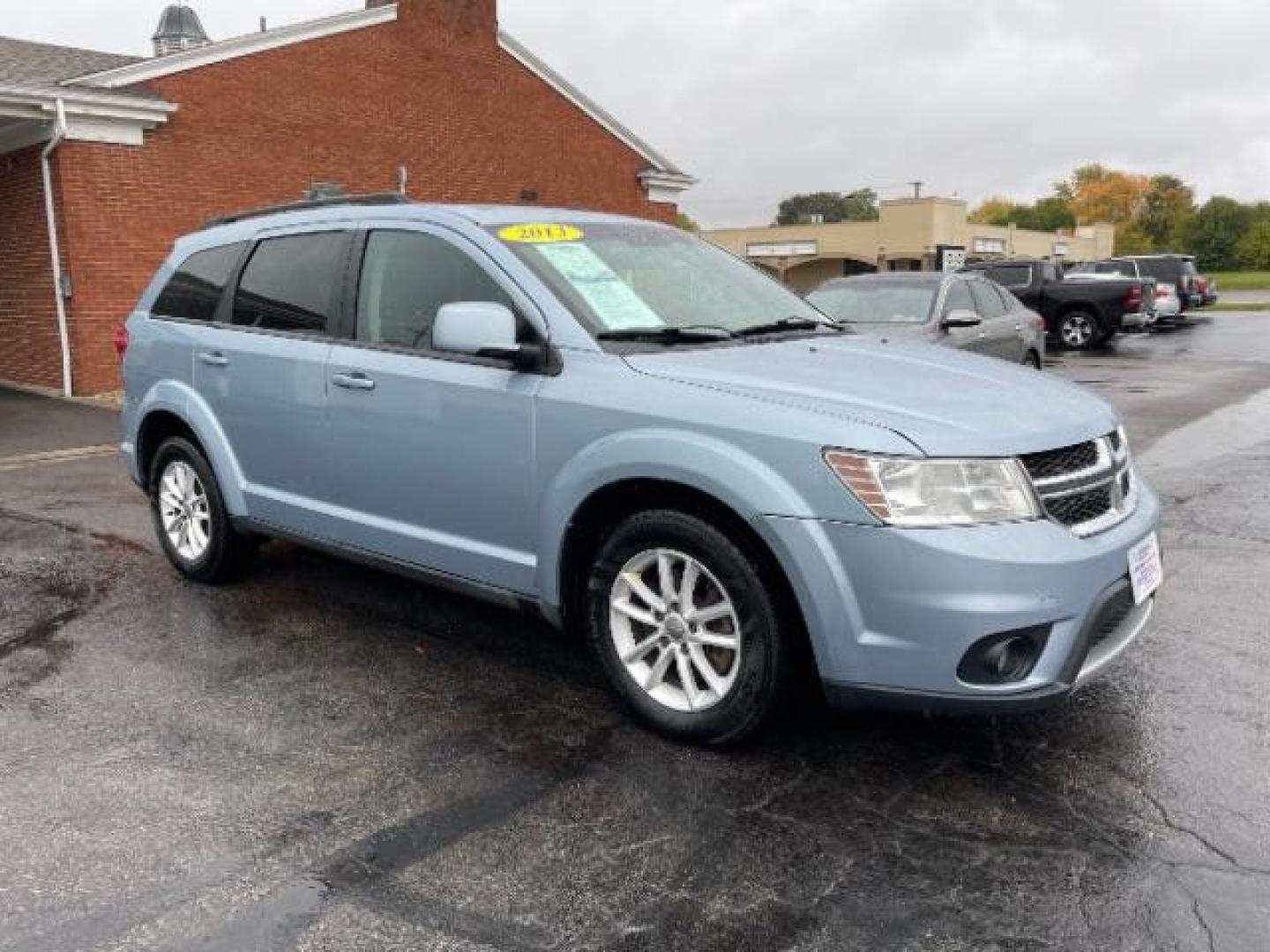 2013 Fathom Blue Pearl Dodge Journey SXT AWD (3C4PDDBGXDT) with an 3.6L V6 DOHC 24V engine, 6-Speed Automatic transmission, located at 1099 N County Rd 25A, OH, 45373, (937) 908-9800, 40.057079, -84.212883 - Third Row - Photo#0