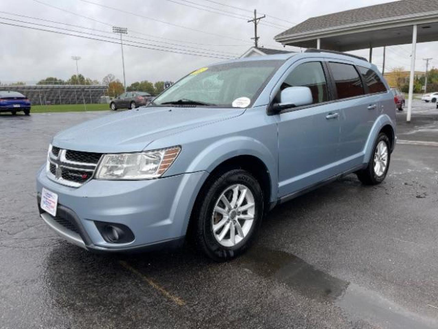 2013 Fathom Blue Pearl Dodge Journey SXT AWD (3C4PDDBGXDT) with an 3.6L V6 DOHC 24V engine, 6-Speed Automatic transmission, located at 1099 N County Rd 25A, OH, 45373, (937) 908-9800, 40.057079, -84.212883 - Third Row - Photo#1