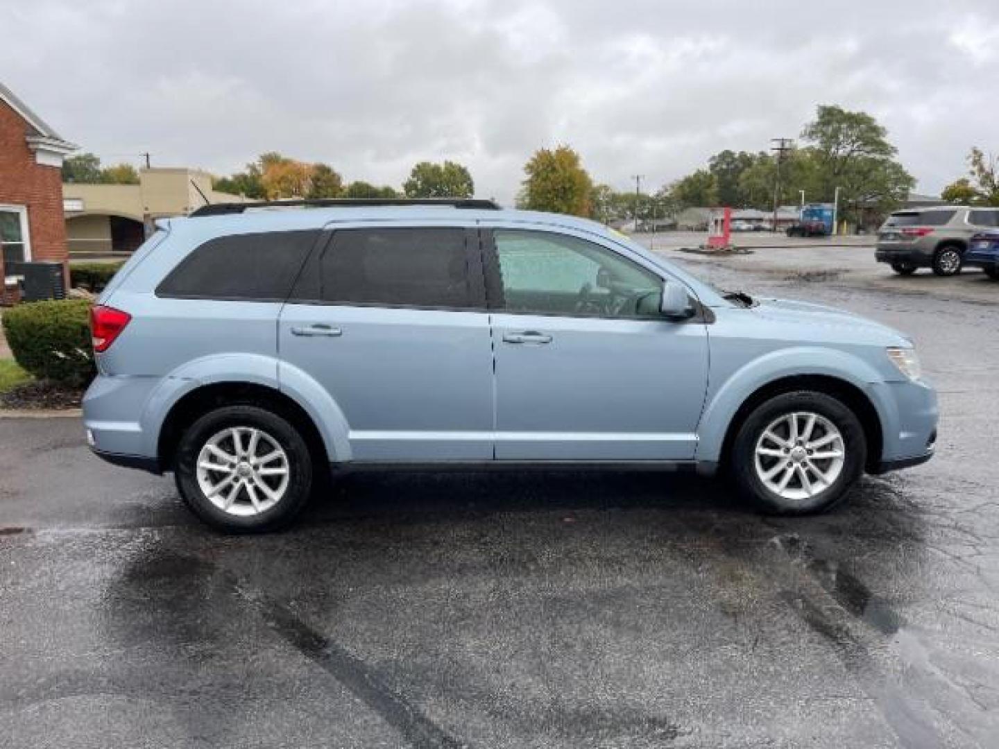 2013 Fathom Blue Pearl Dodge Journey SXT AWD (3C4PDDBGXDT) with an 3.6L V6 DOHC 24V engine, 6-Speed Automatic transmission, located at 1099 N County Rd 25A, OH, 45373, (937) 908-9800, 40.057079, -84.212883 - Third Row - Photo#4