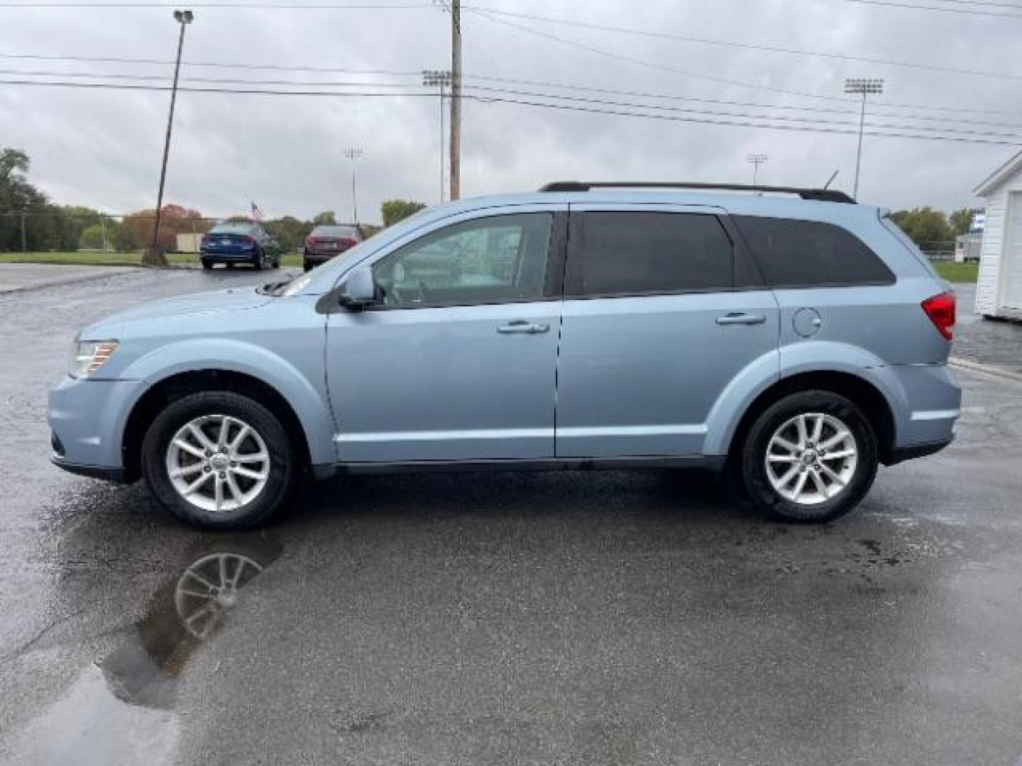 2013 Fathom Blue Pearl Dodge Journey SXT AWD (3C4PDDBGXDT) with an 3.6L V6 DOHC 24V engine, 6-Speed Automatic transmission, located at 1099 N County Rd 25A, OH, 45373, (937) 908-9800, 40.057079, -84.212883 - Third Row - Photo#5