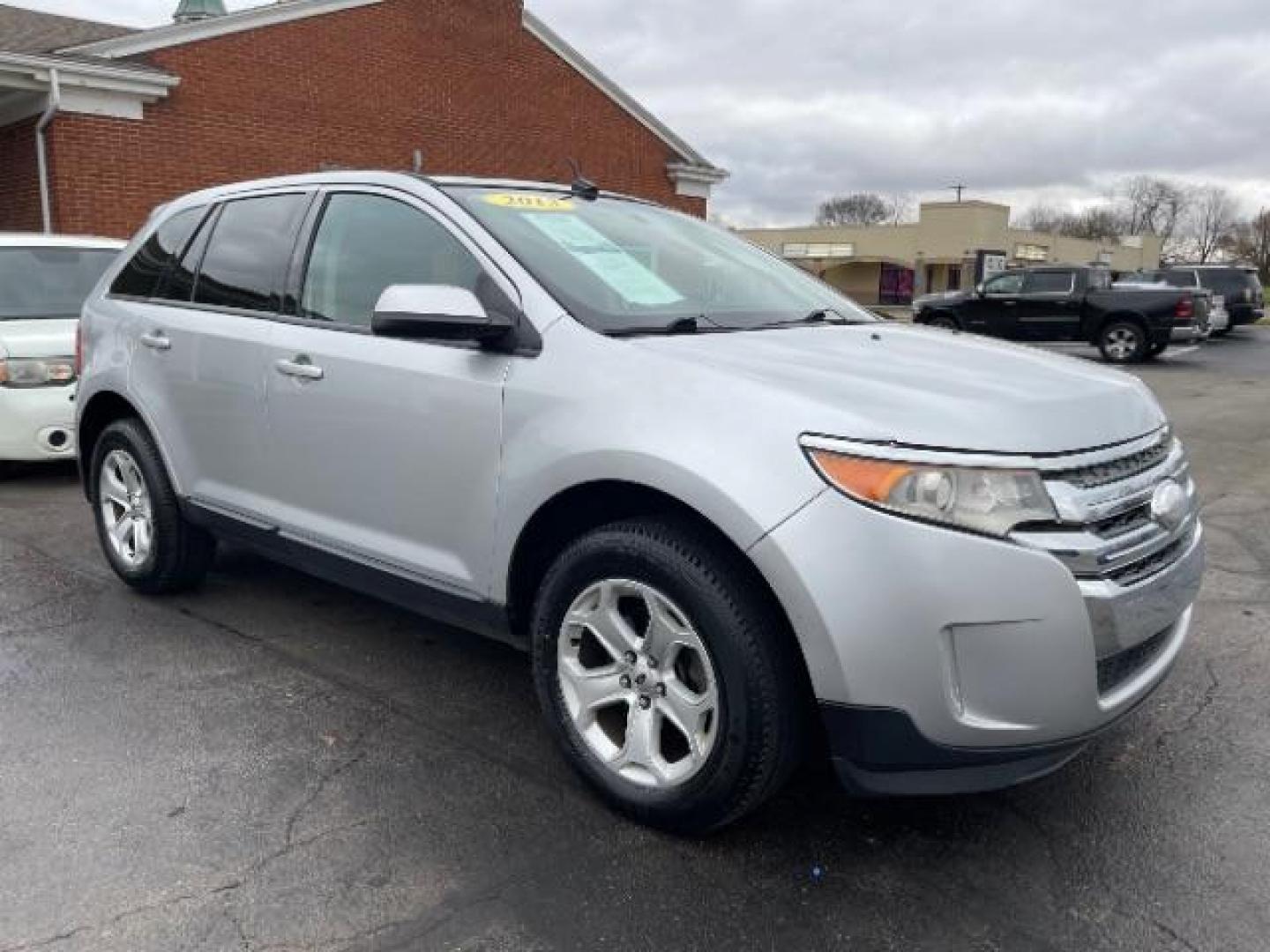 2013 Ingot Silver Metallic Ford Edge SEL AWD (2FMDK4JC9DB) with an 3.5L V6 DOHC 24V engine, 6-Speed Automatic transmission, located at 1099 N County Rd 25A, OH, 45373, (937) 908-9800, 40.057079, -84.212883 - Photo#0