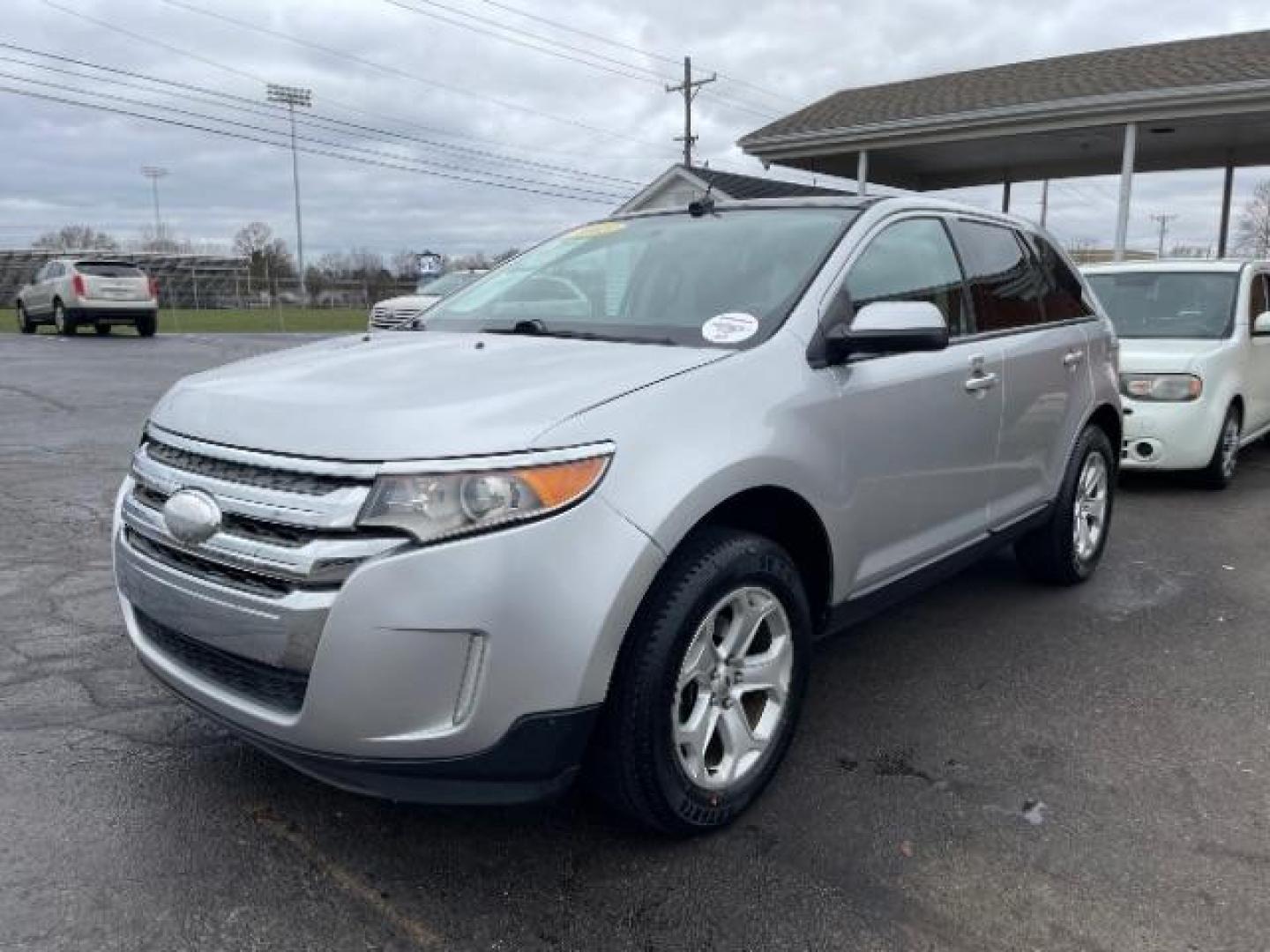 2013 Ingot Silver Metallic Ford Edge SEL AWD (2FMDK4JC9DB) with an 3.5L V6 DOHC 24V engine, 6-Speed Automatic transmission, located at 1099 N County Rd 25A, OH, 45373, (937) 908-9800, 40.057079, -84.212883 - Photo#1