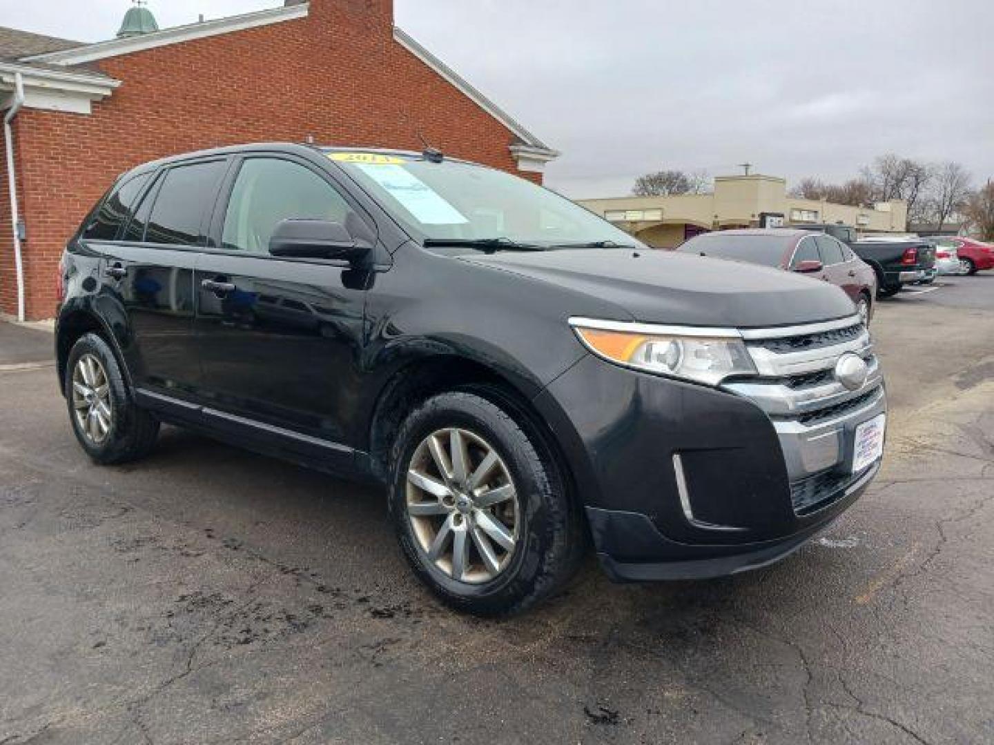 2013 Tuxedo Black Metallic Ford Edge SEL AWD (2FMDK4JC4DB) with an 3.5L V6 DOHC 24V engine, 6-Speed Automatic transmission, located at 880 E. National Road, Vandalia, OH, 45377, (937) 908-9800, 39.892189, -84.181015 - Photo#0