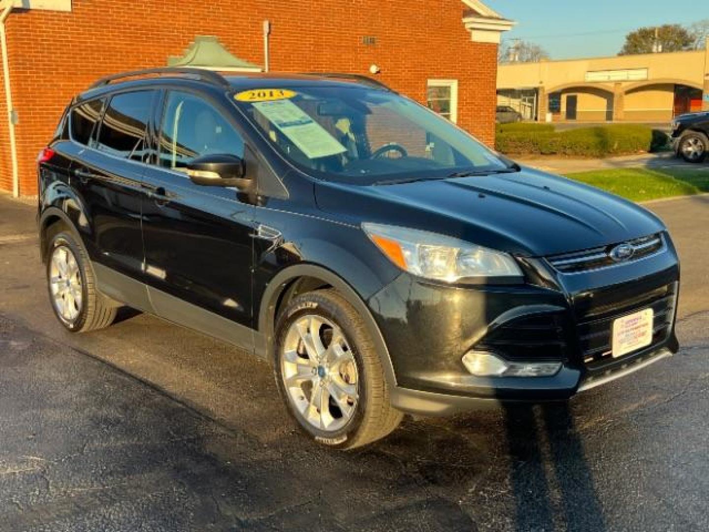 2013 Tuxedo Black Ford Escape SEL 4WD (1FMCU9H95DU) with an 2.0L L4 DOHC 16V engine, 6-Speed Automatic transmission, located at 401 Woodman Dr, Riverside, OH, 45431, (937) 908-9800, 39.763779, -84.122063 - Photo#0