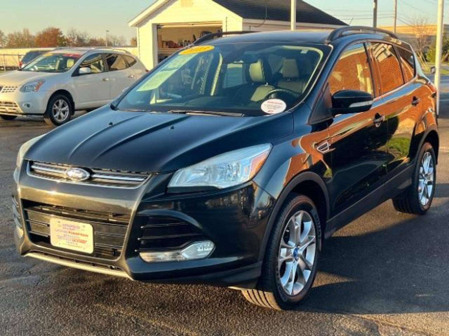 2013 Tuxedo Black Ford Escape SEL 4WD (1FMCU9H95DU) with an 2.0L L4 DOHC 16V engine, 6-Speed Automatic transmission, located at 401 Woodman Dr, Riverside, OH, 45431, (937) 908-9800, 39.763779, -84.122063 - Photo#2