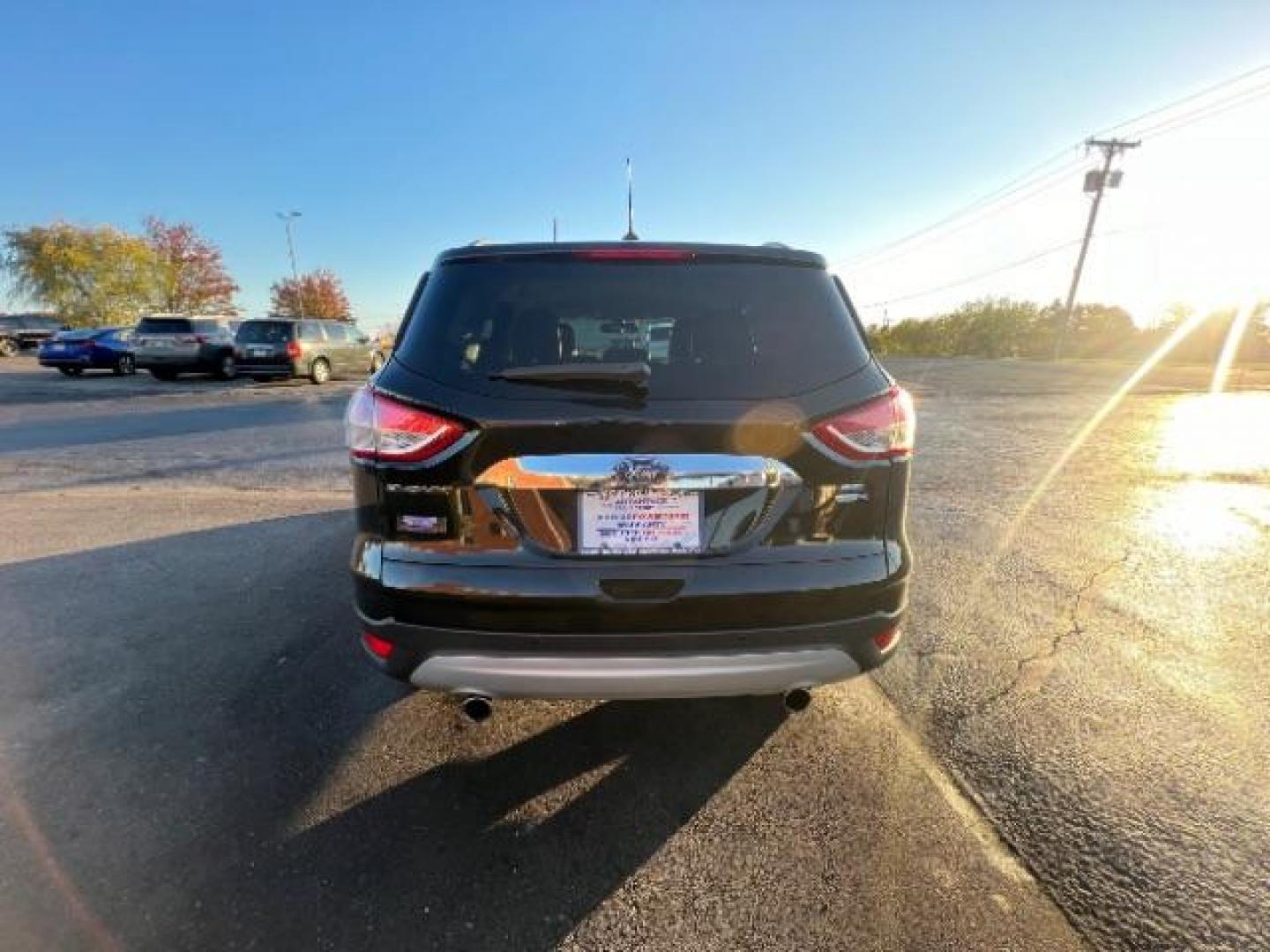 2013 Tuxedo Black Ford Escape SEL 4WD (1FMCU9H95DU) with an 2.0L L4 DOHC 16V engine, 6-Speed Automatic transmission, located at 401 Woodman Dr, Riverside, OH, 45431, (937) 908-9800, 39.763779, -84.122063 - Photo#4