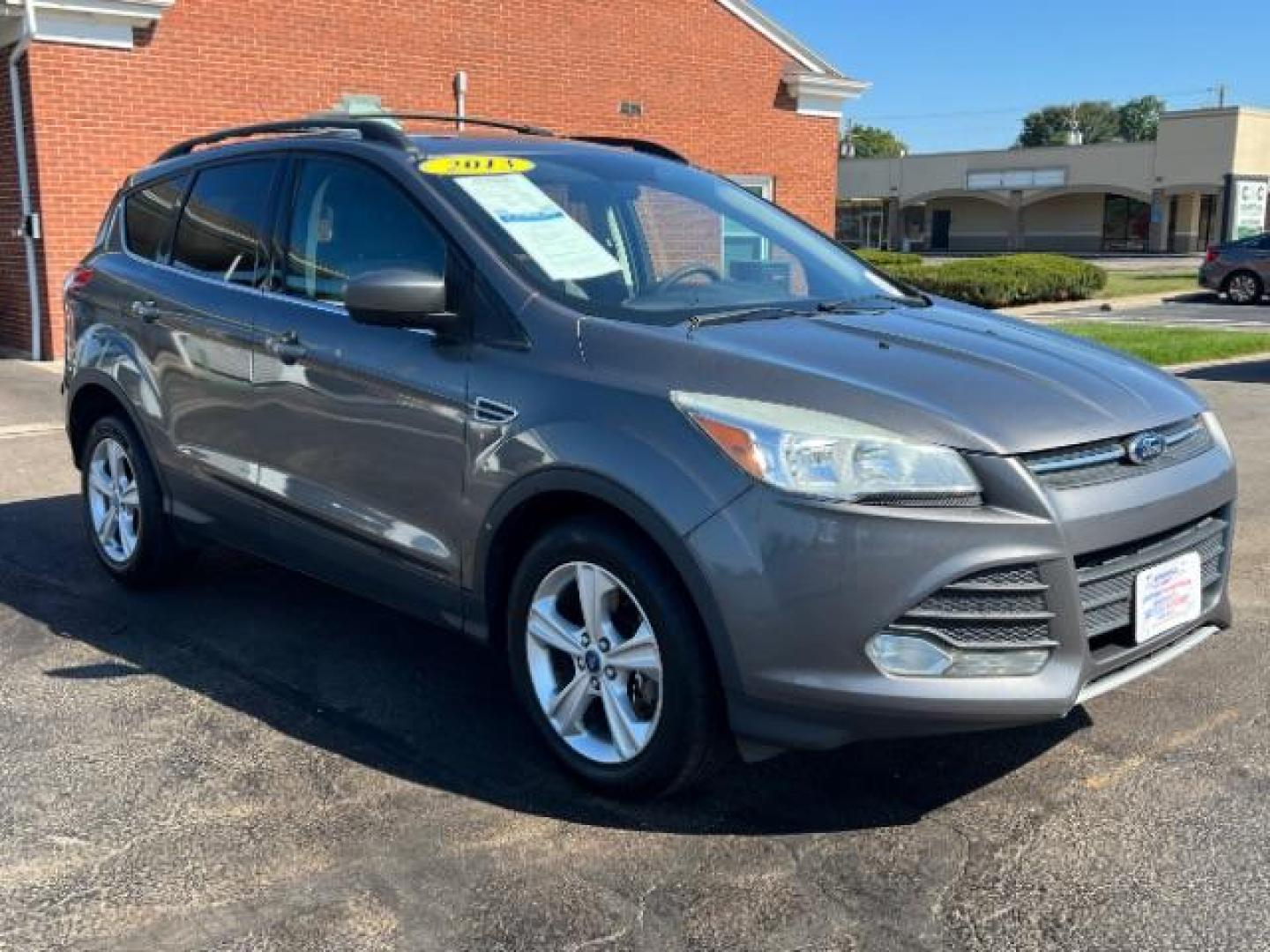 2013 Sterling Grey Metallic Ford Escape SE 4WD (1FMCU9G92DU) with an 2.0L L4 DOHC 16V engine, 6-Speed Automatic transmission, located at 880 E. National Road, Vandalia, OH, 45377, (937) 908-9800, 39.892189, -84.181015 - Photo#0