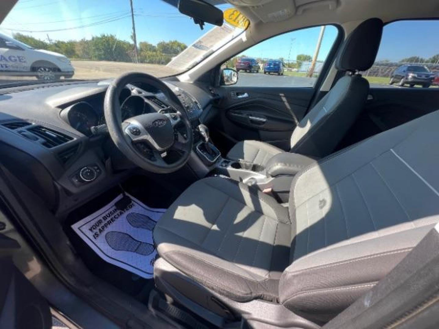 2013 Sterling Grey Metallic Ford Escape SE 4WD (1FMCU9G92DU) with an 2.0L L4 DOHC 16V engine, 6-Speed Automatic transmission, located at 880 E. National Road, Vandalia, OH, 45377, (937) 908-9800, 39.892189, -84.181015 - Photo#6