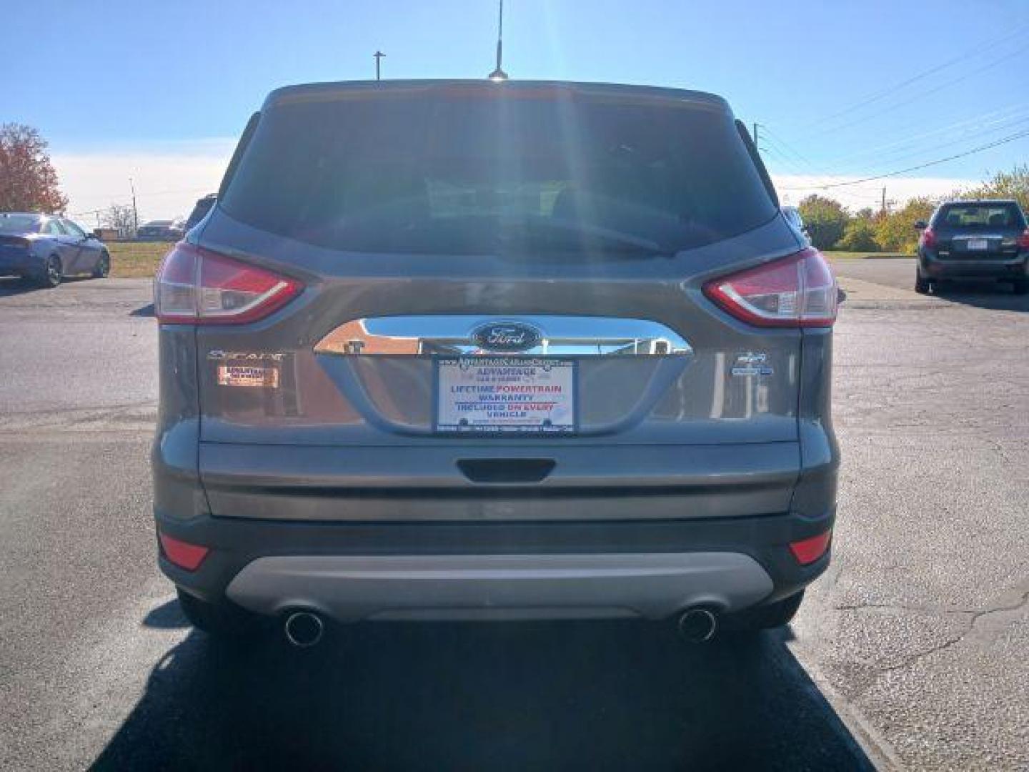 2013 Sterling Grey Metallic Ford Escape SEL 4WD (1FMCU9H94DU) with an 2.0L L4 DOHC 16V engine, 6-Speed Automatic transmission, located at 1099 N County Rd 25A, OH, 45373, (937) 908-9800, 40.057079, -84.212883 - Photo#5