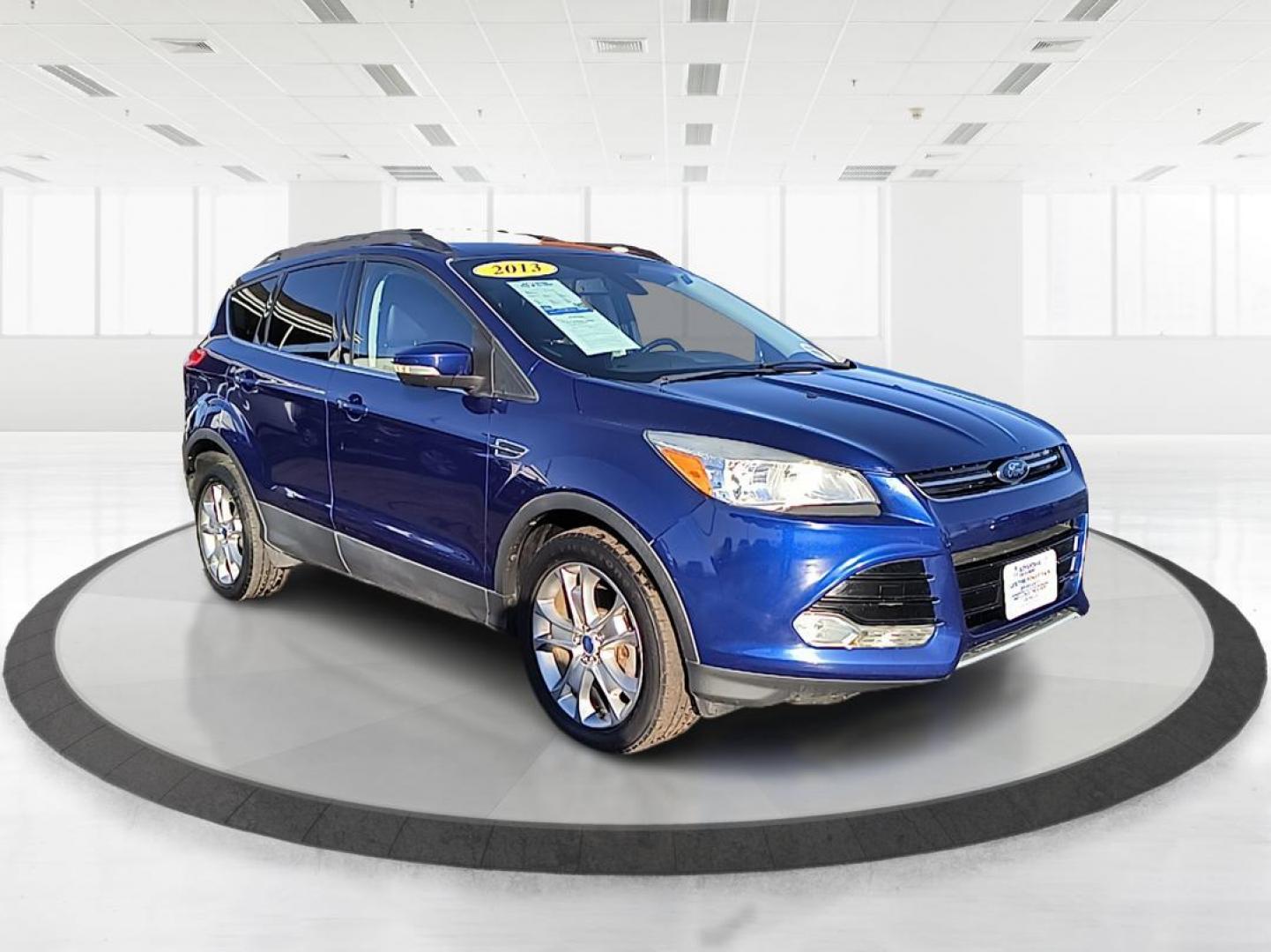 2013 Ford Escape SEL FWD (1FMCU0H99DU) with an 2.0L L4 DOHC 16V engine, 6-Speed Automatic transmission, located at 1099 N County Rd 25A, Troy, OH, 45373, (937) 908-9800, 40.057079, -84.212883 - 2013 Ford Escape SEL FWD - Photo#0