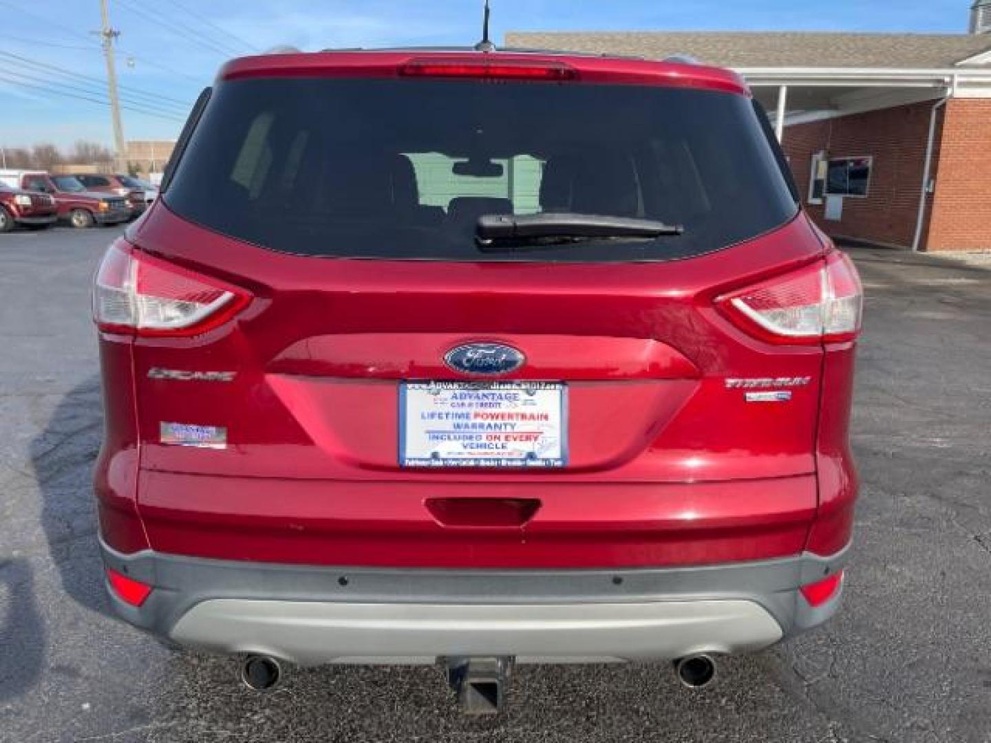 2013 Ruby Red Metallic Tinted Ford Escape Titanium 4WD (1FMCU9J92DU) with an 2.0L L4 DOHC 16V engine, 6-Speed Automatic transmission, located at 4508 South Dixie Dr, Moraine, OH, 45439, (937) 908-9800, 39.690136, -84.216438 - Photo#3