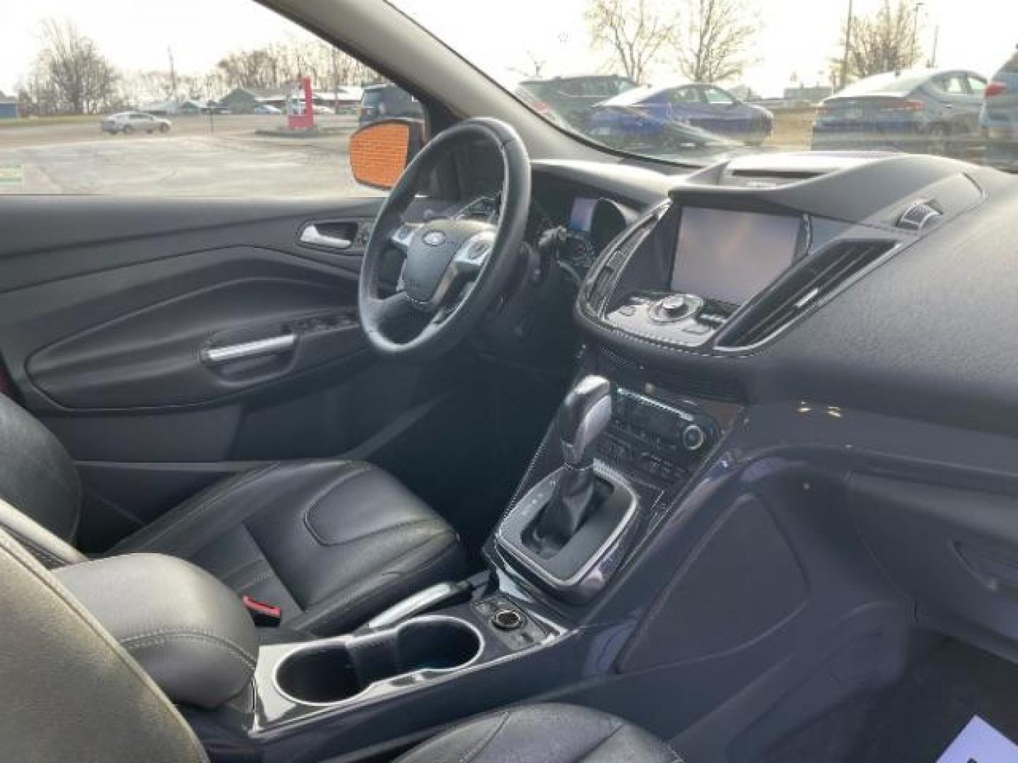 2013 Ruby Red Metallic Tinted Ford Escape Titanium 4WD (1FMCU9J92DU) with an 2.0L L4 DOHC 16V engine, 6-Speed Automatic transmission, located at 4508 South Dixie Dr, Moraine, OH, 45439, (937) 908-9800, 39.690136, -84.216438 - Photo#7