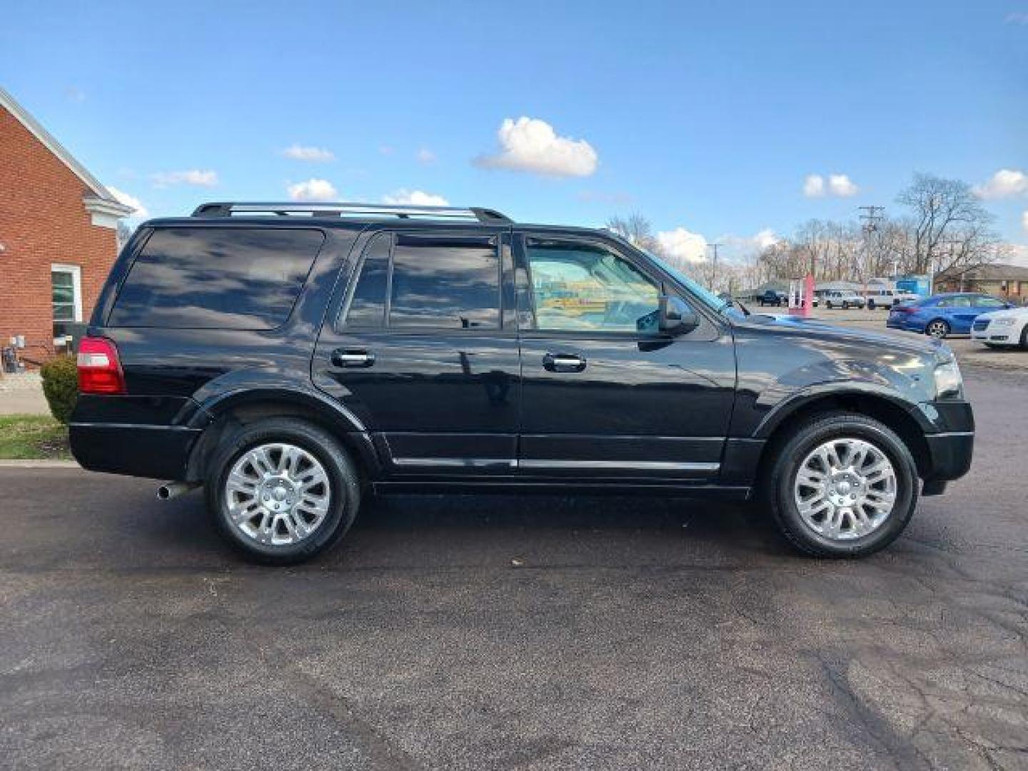 2013 Tuxedo Black Metallic Ford Expedition Limited 2WD (1FMJU1K58DE) with an 5.4L V8 SOHC 16V FFV engine, 6-Speed Automatic transmission, located at 880 E. National Road, Vandalia, OH, 45377, (937) 908-9800, 39.892189, -84.181015 - Photo#4