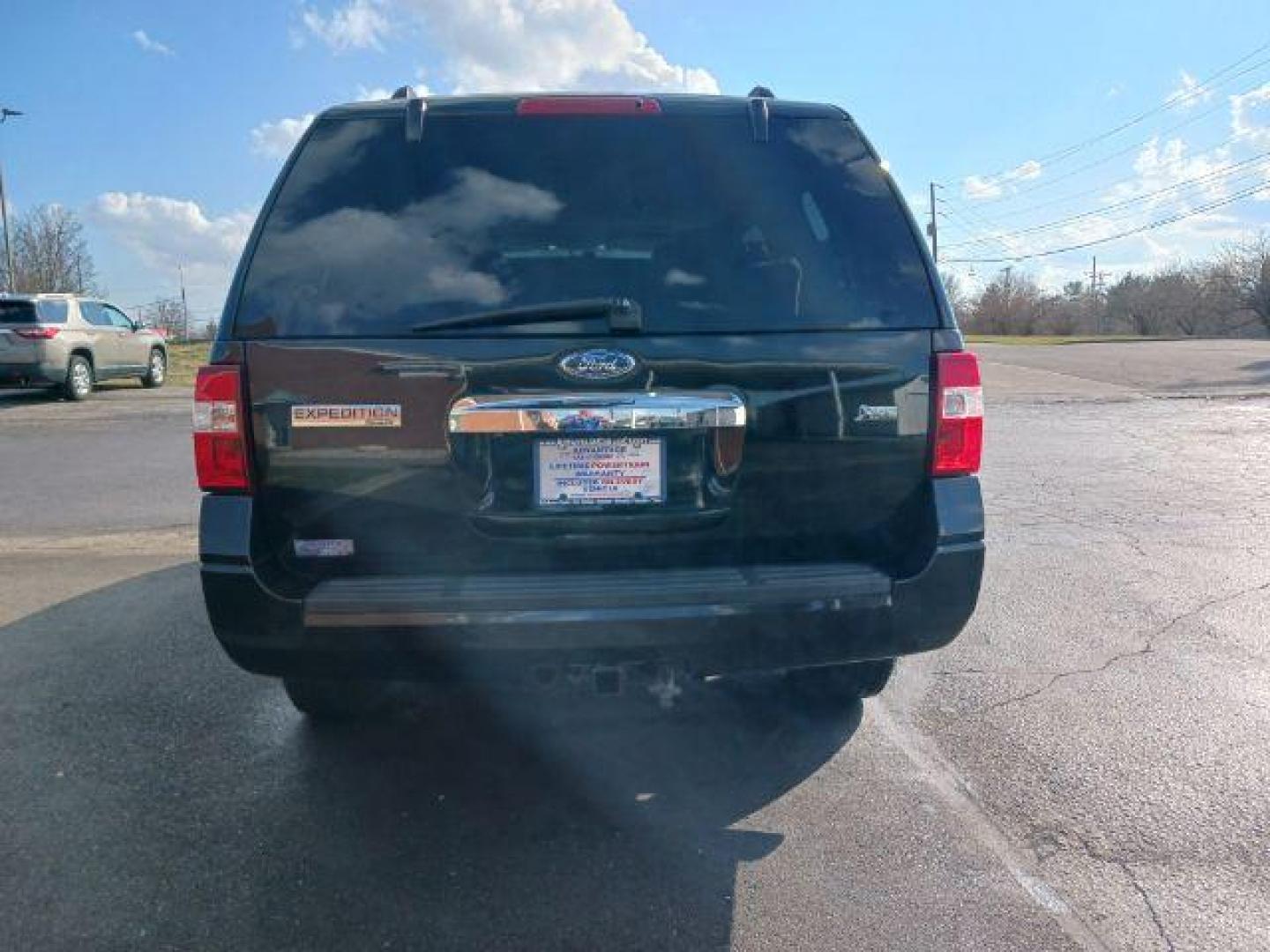 2013 Tuxedo Black Metallic Ford Expedition Limited 2WD (1FMJU1K58DE) with an 5.4L V8 SOHC 16V FFV engine, 6-Speed Automatic transmission, located at 880 E. National Road, Vandalia, OH, 45377, (937) 908-9800, 39.892189, -84.181015 - Photo#5