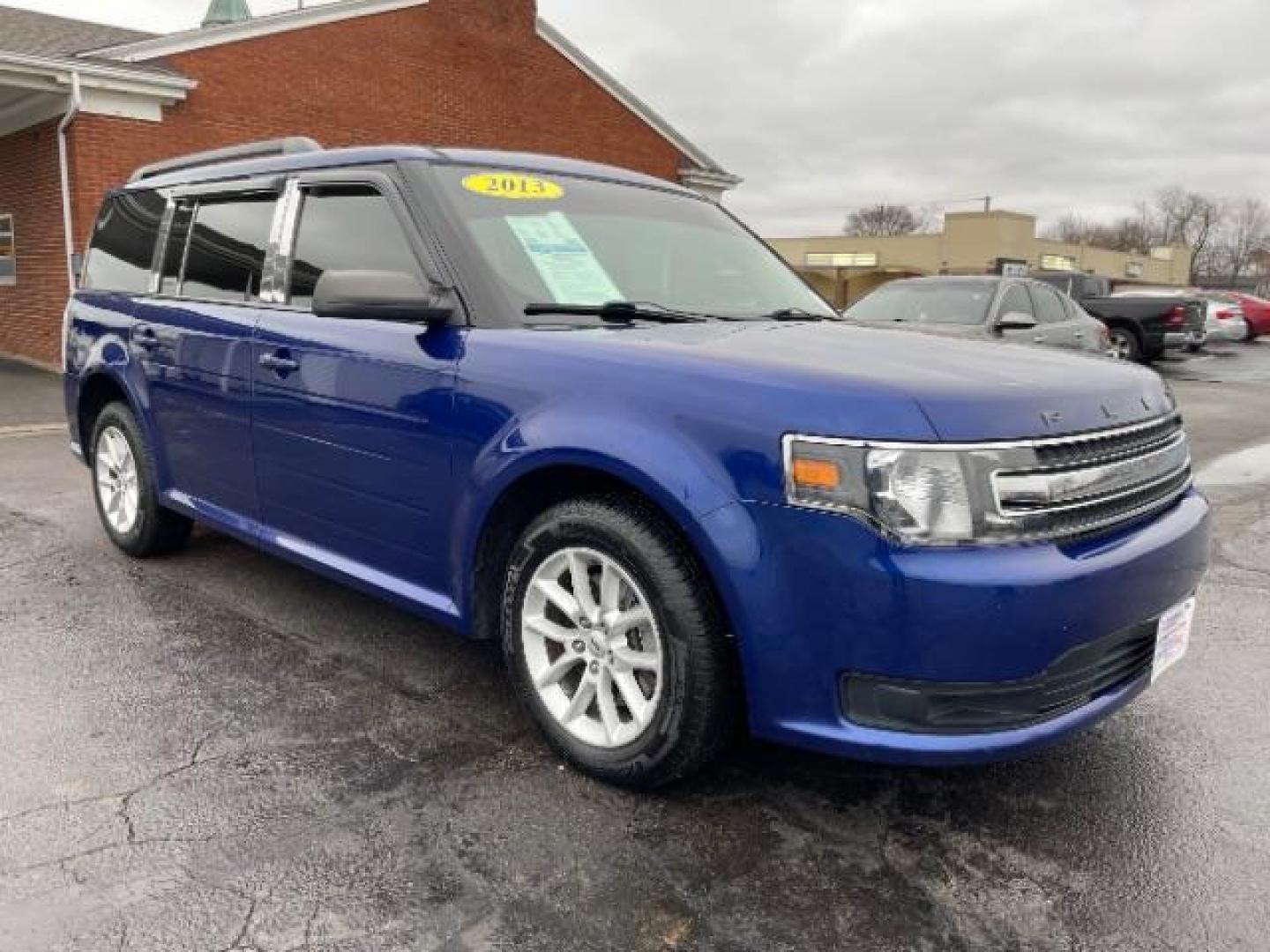 2013 Deep Impact Blue Metallic Ford Flex SE FWD (2FMGK5B8XDB) with an 3.5L V6 DOHC 24V engine, 6-Speed Automatic Overdrive transmission, located at 1099 N County Rd 25A, OH, 45373, (937) 908-9800, 40.057079, -84.212883 - Photo#0