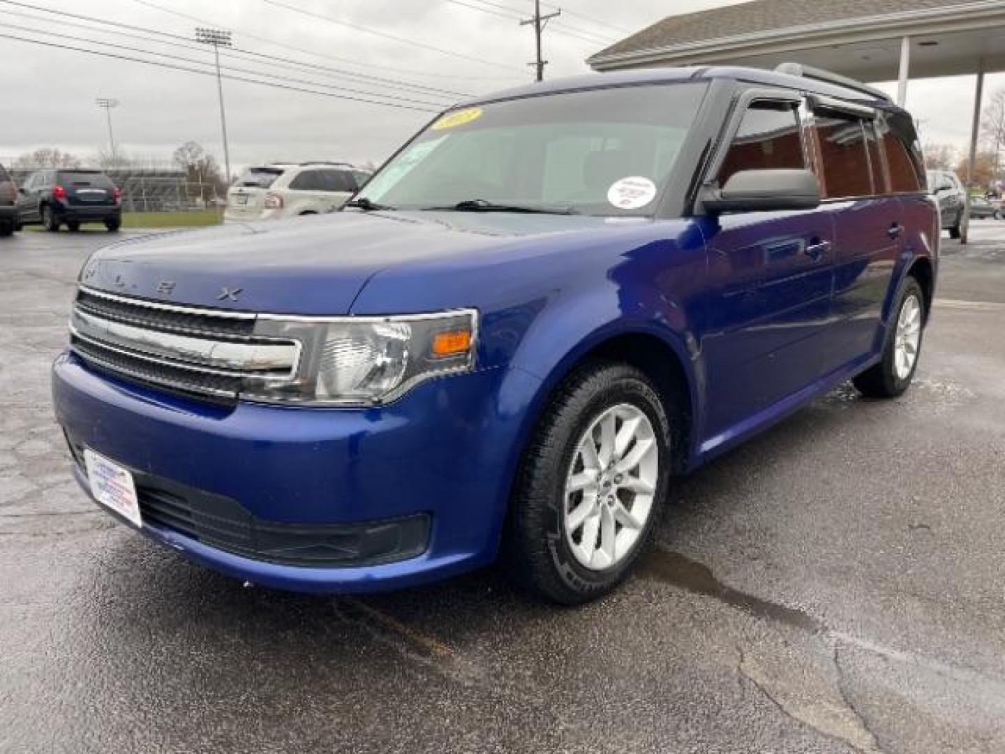 2013 Deep Impact Blue Metallic Ford Flex SE FWD (2FMGK5B8XDB) with an 3.5L V6 DOHC 24V engine, 6-Speed Automatic Overdrive transmission, located at 1099 N County Rd 25A, OH, 45373, (937) 908-9800, 40.057079, -84.212883 - Photo#1