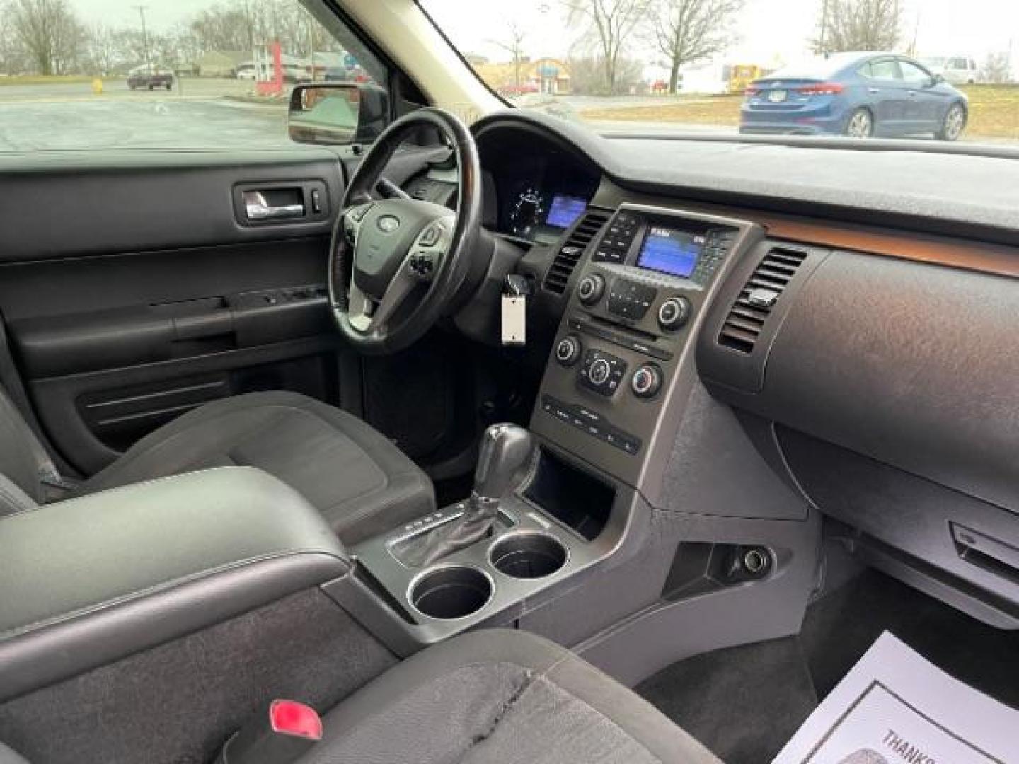 2013 Deep Impact Blue Metallic Ford Flex SE FWD (2FMGK5B8XDB) with an 3.5L V6 DOHC 24V engine, 6-Speed Automatic Overdrive transmission, located at 1099 N County Rd 25A, OH, 45373, (937) 908-9800, 40.057079, -84.212883 - Photo#8