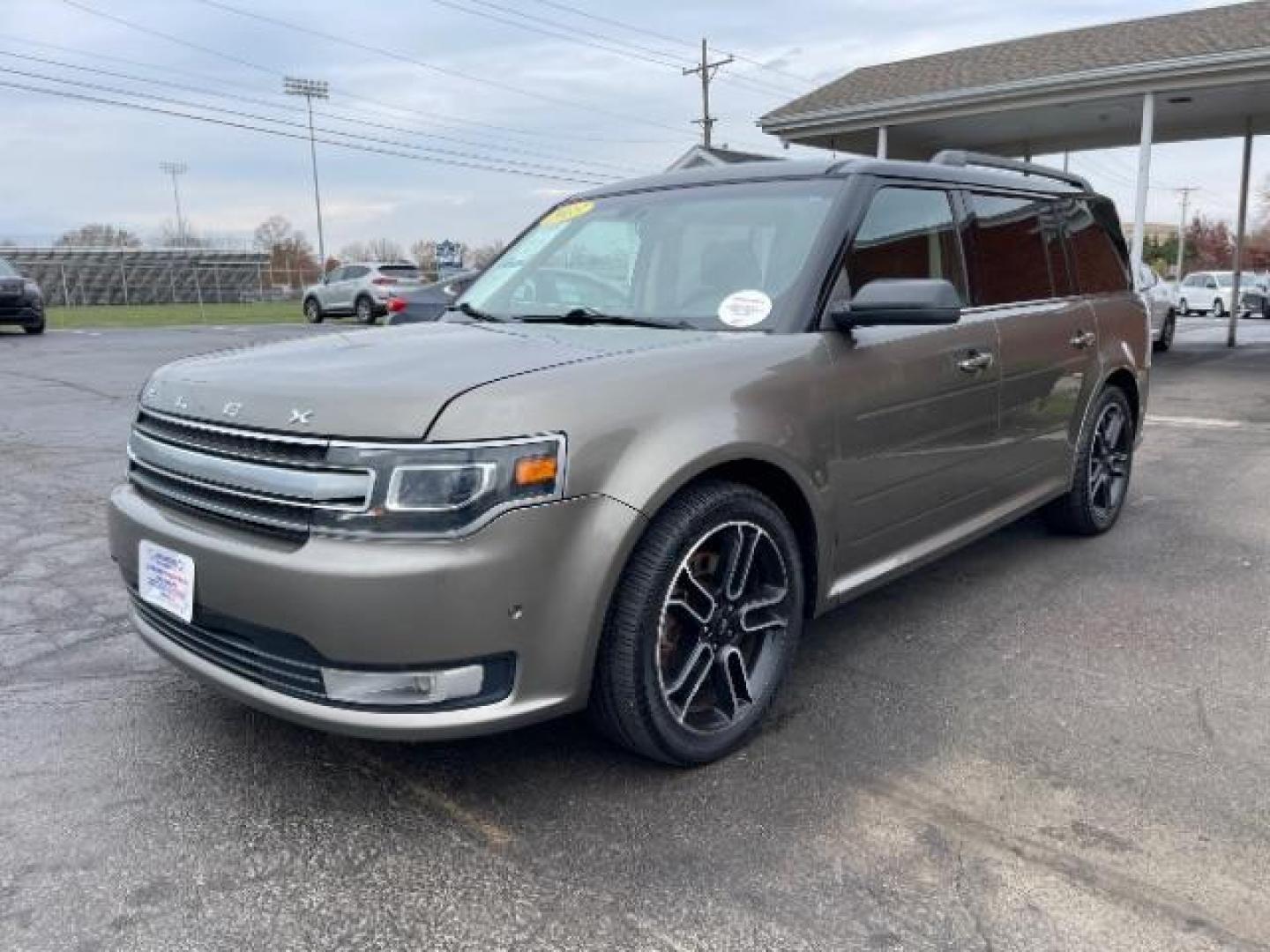 2013 Mineral Gray Metallic Ford Flex Limited AWD (2FMHK6DT2DB) with an 3.5L V6 DOHC 24V engine, 6-Speed Automatic Overdrive transmission, located at 1184 Kauffman Ave, Fairborn, OH, 45324, (937) 908-9800, 39.807365, -84.029114 - Photo#1