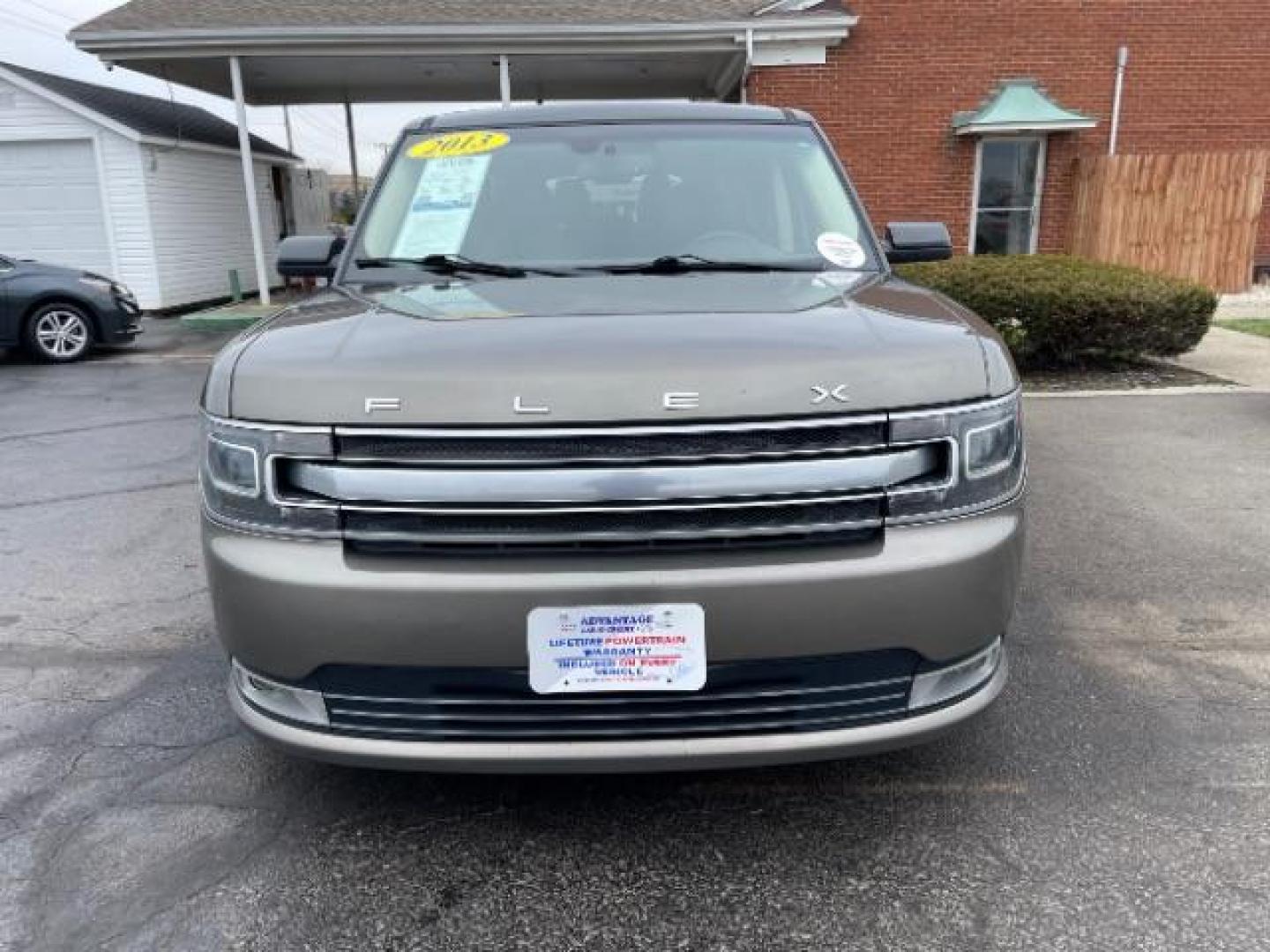 2013 Mineral Gray Metallic Ford Flex Limited AWD (2FMHK6DT2DB) with an 3.5L V6 DOHC 24V engine, 6-Speed Automatic Overdrive transmission, located at 1184 Kauffman Ave, Fairborn, OH, 45324, (937) 908-9800, 39.807365, -84.029114 - Photo#2