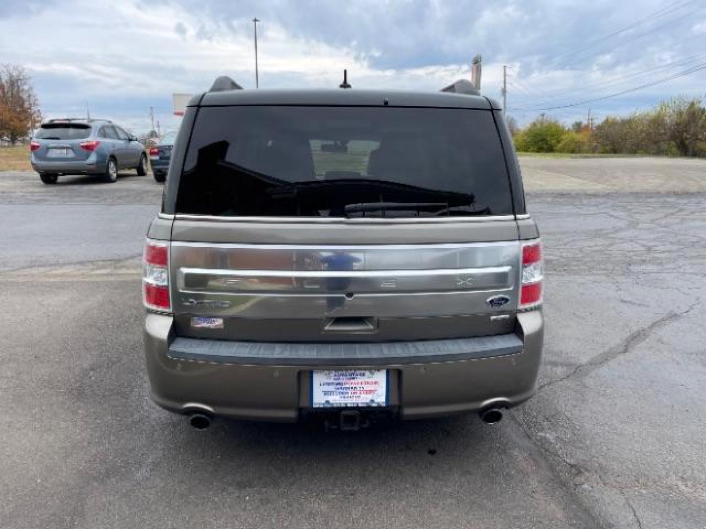 2013 Mineral Gray Metallic Ford Flex Limited AWD (2FMHK6DT2DB) with an 3.5L V6 DOHC 24V engine, 6-Speed Automatic Overdrive transmission, located at 1184 Kauffman Ave, Fairborn, OH, 45324, (937) 908-9800, 39.807365, -84.029114 - Photo#3