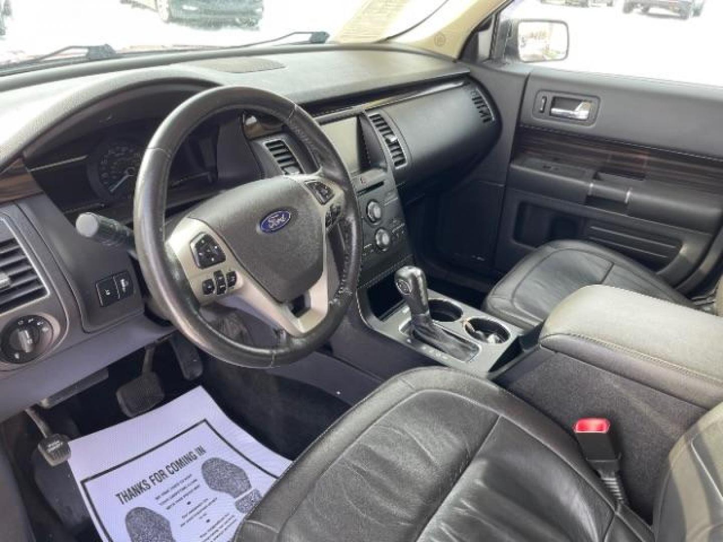 2013 Ruby Red Metallic Tinted Ford Flex SEL FWD (2FMGK5C84DB) with an 3.5L V6 DOHC 24V engine, 6-Speed Automatic Overdrive transmission, located at 1184 Kauffman Ave, Fairborn, OH, 45324, (937) 908-9800, 39.807365, -84.029114 - Photo#6