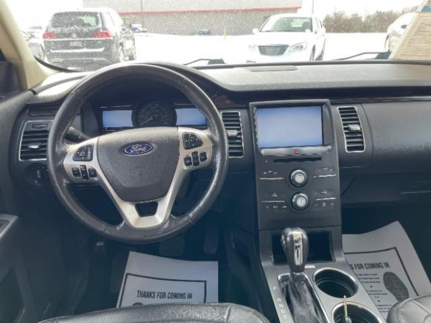 2013 Ruby Red Metallic Tinted Ford Flex SEL FWD (2FMGK5C84DB) with an 3.5L V6 DOHC 24V engine, 6-Speed Automatic Overdrive transmission, located at 1184 Kauffman Ave, Fairborn, OH, 45324, (937) 908-9800, 39.807365, -84.029114 - Photo#7