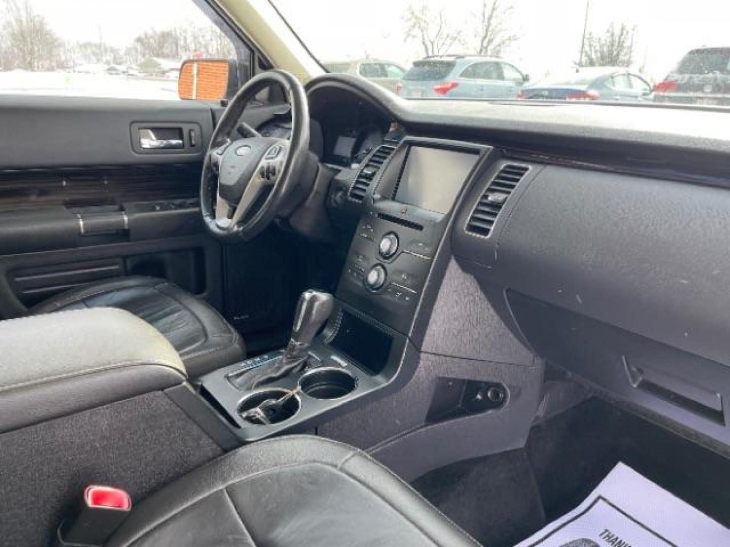 2013 Ruby Red Metallic Tinted Ford Flex SEL FWD (2FMGK5C84DB) with an 3.5L V6 DOHC 24V engine, 6-Speed Automatic Overdrive transmission, located at 1184 Kauffman Ave, Fairborn, OH, 45324, (937) 908-9800, 39.807365, -84.029114 - Photo#8