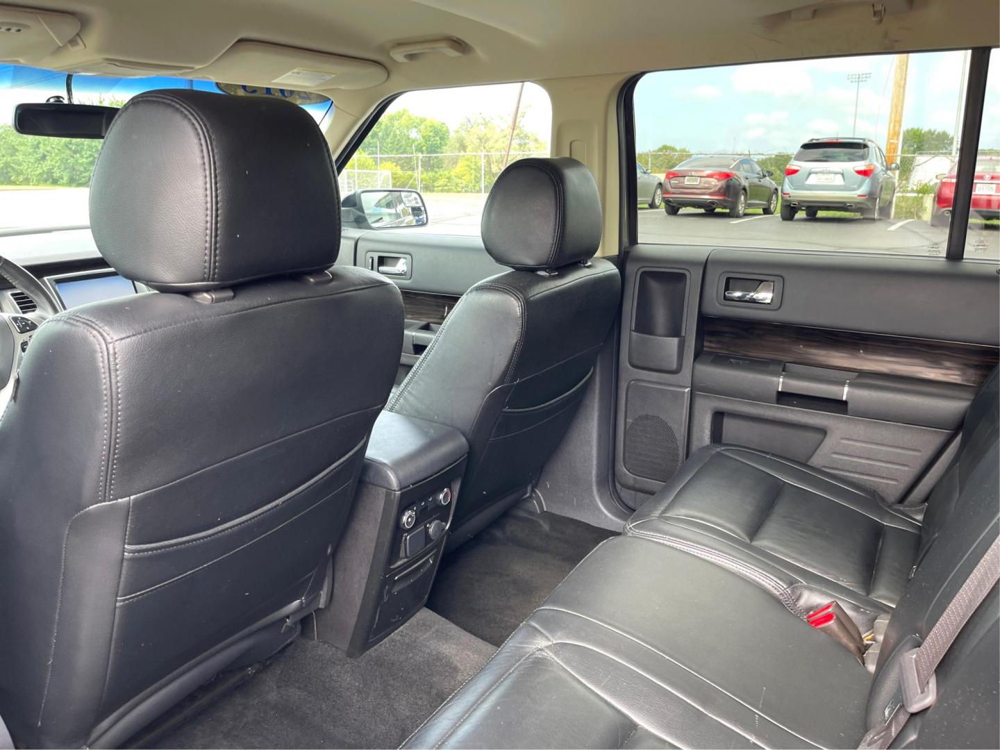 2013 Mineral Gray Metallic Ford Flex SEL FWD (2FMGK5C85DB) with an 3.5L V6 DOHC 24V engine, 6-Speed Automatic Overdrive transmission, located at 880 E. National Road, Vandalia, OH, 45377, (937) 908-9800, 39.892189, -84.181015 - Third Row - Photo#9