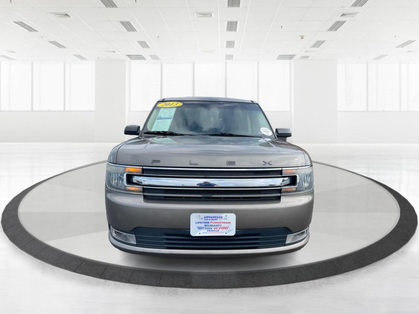 2013 Mineral Gray Metallic Ford Flex SEL FWD (2FMGK5C85DB) with an 3.5L V6 DOHC 24V engine, 6-Speed Automatic Overdrive transmission, located at 880 E. National Road, Vandalia, OH, 45377, (937) 908-9800, 39.892189, -84.181015 - Third Row - Photo#6