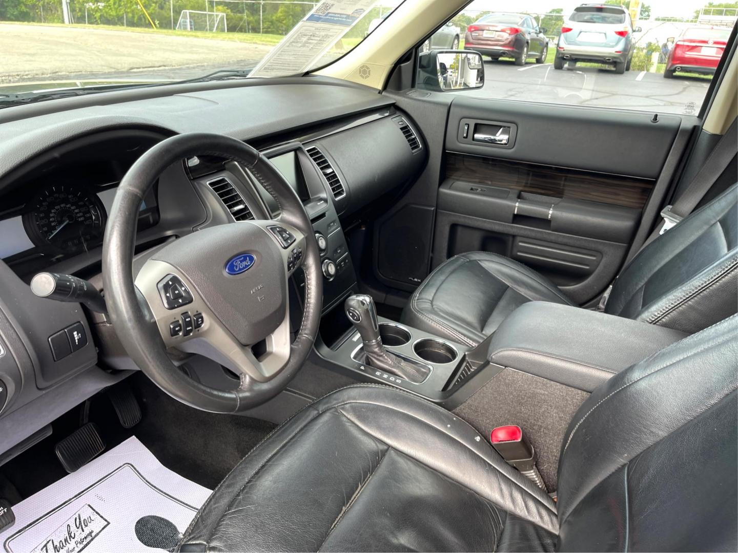 2013 Mineral Gray Metallic Ford Flex SEL FWD (2FMGK5C85DB) with an 3.5L V6 DOHC 24V engine, 6-Speed Automatic Overdrive transmission, located at 880 E. National Road, Vandalia, OH, 45377, (937) 908-9800, 39.892189, -84.181015 - Third Row - Photo#8