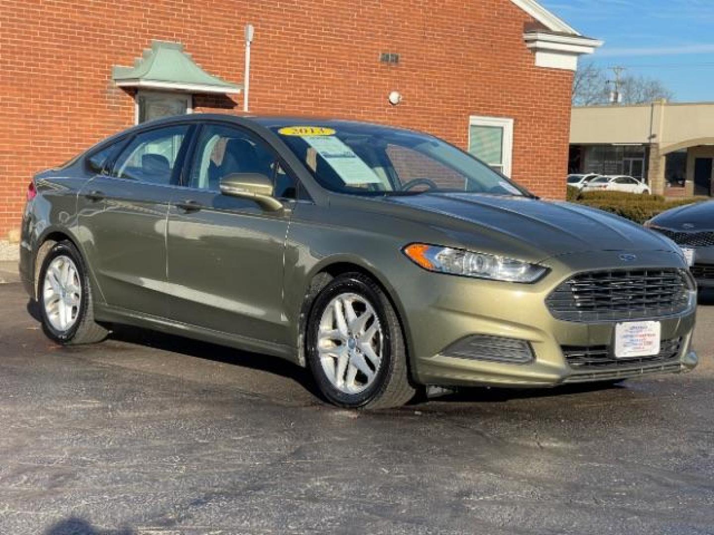 2013 Ginger Ale Ford Fusion SE (3FA6P0H73DR) with an 2.5L L4 DOHC 16V engine, located at 880 E. National Road, Vandalia, OH, 45377, (937) 908-9800, 39.892189, -84.181015 - Photo#0