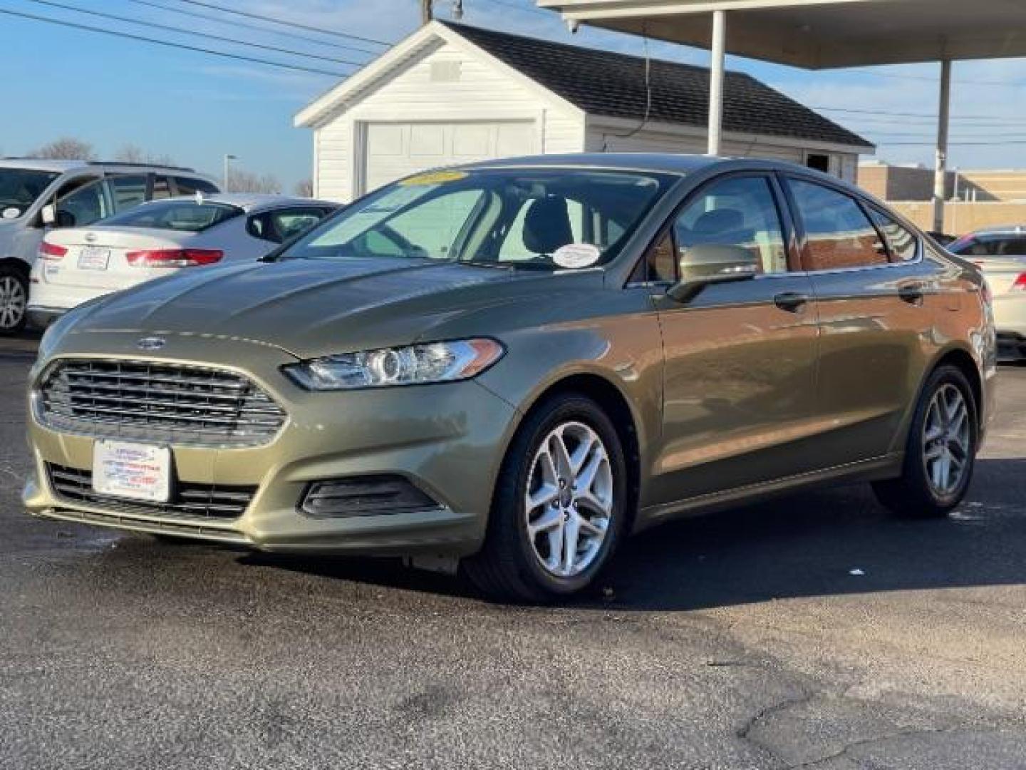 2013 Ginger Ale Ford Fusion SE (3FA6P0H73DR) with an 2.5L L4 DOHC 16V engine, located at 880 E. National Road, Vandalia, OH, 45377, (937) 908-9800, 39.892189, -84.181015 - Photo#1