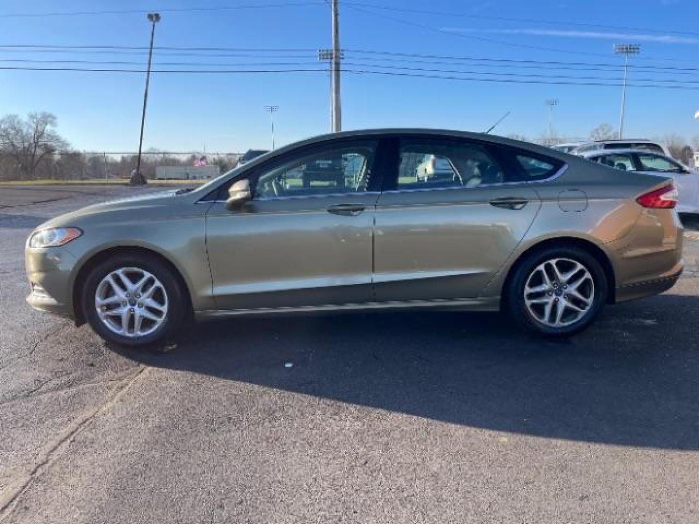 2013 Ginger Ale Ford Fusion SE (3FA6P0H73DR) with an 2.5L L4 DOHC 16V engine, located at 880 E. National Road, Vandalia, OH, 45377, (937) 908-9800, 39.892189, -84.181015 - Photo#2