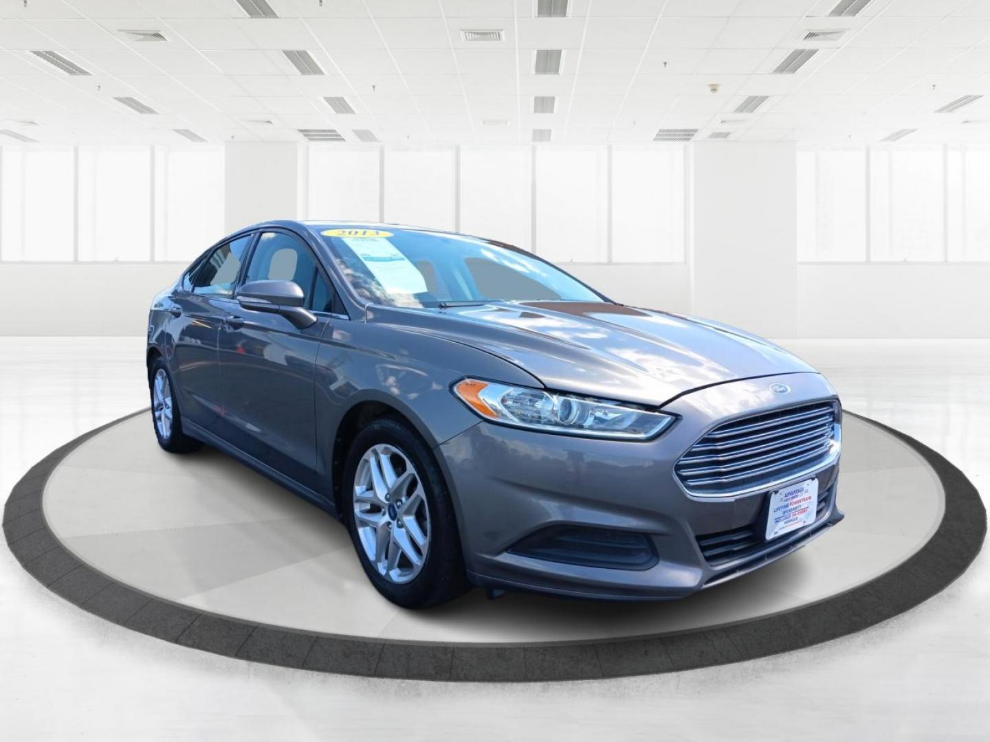 2013 Sterling Gray Ford Fusion (3FA6P0H78DR) with an 2.5L L4 DOHC 16V engine, located at 880 E. National Road, Vandalia, OH, 45377, (937) 908-9800, 39.892189, -84.181015 - Photo#0