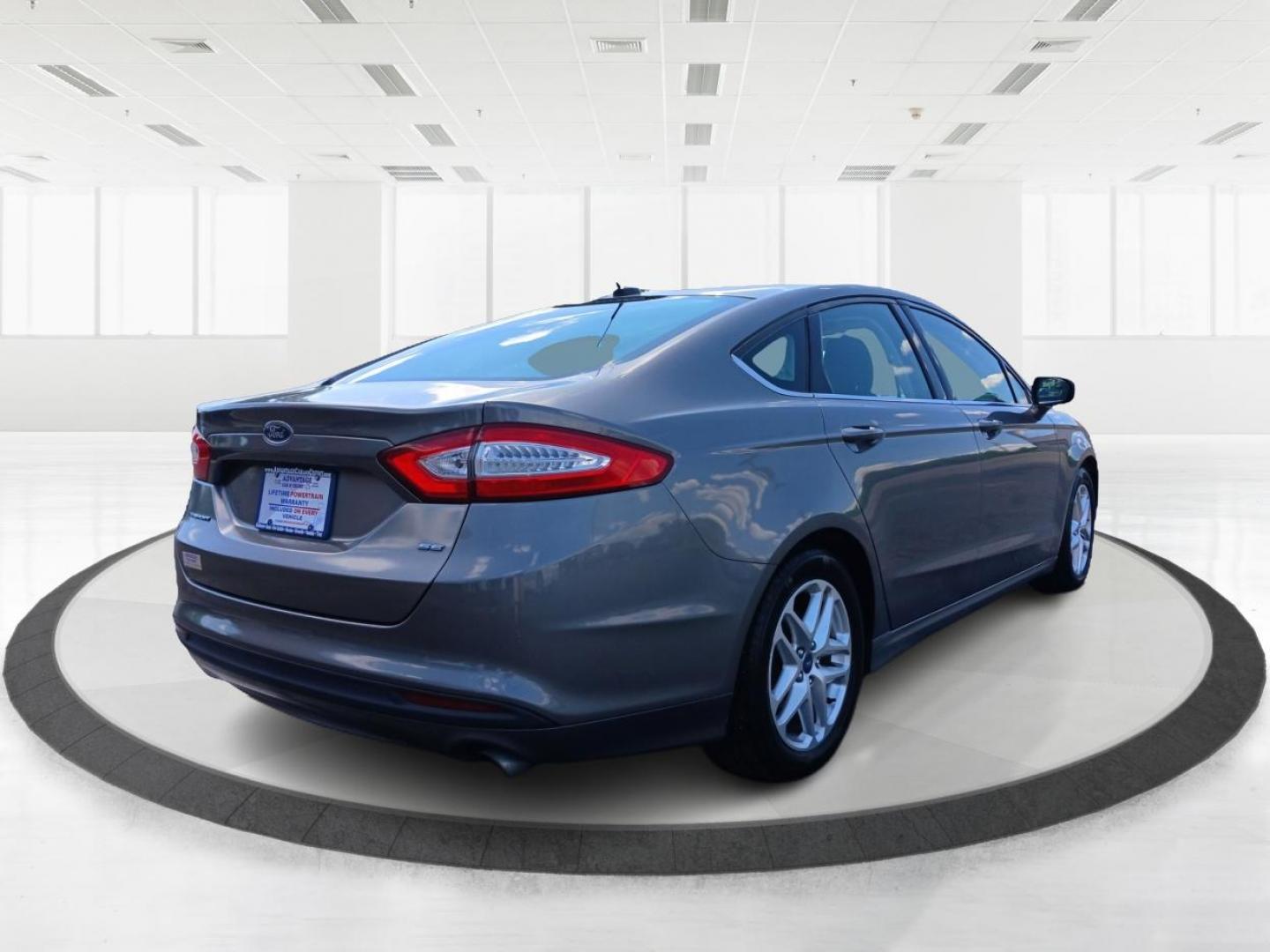 2013 Sterling Gray Ford Fusion (3FA6P0H78DR) with an 2.5L L4 DOHC 16V engine, located at 880 E. National Road, Vandalia, OH, 45377, (937) 908-9800, 39.892189, -84.181015 - Photo#2