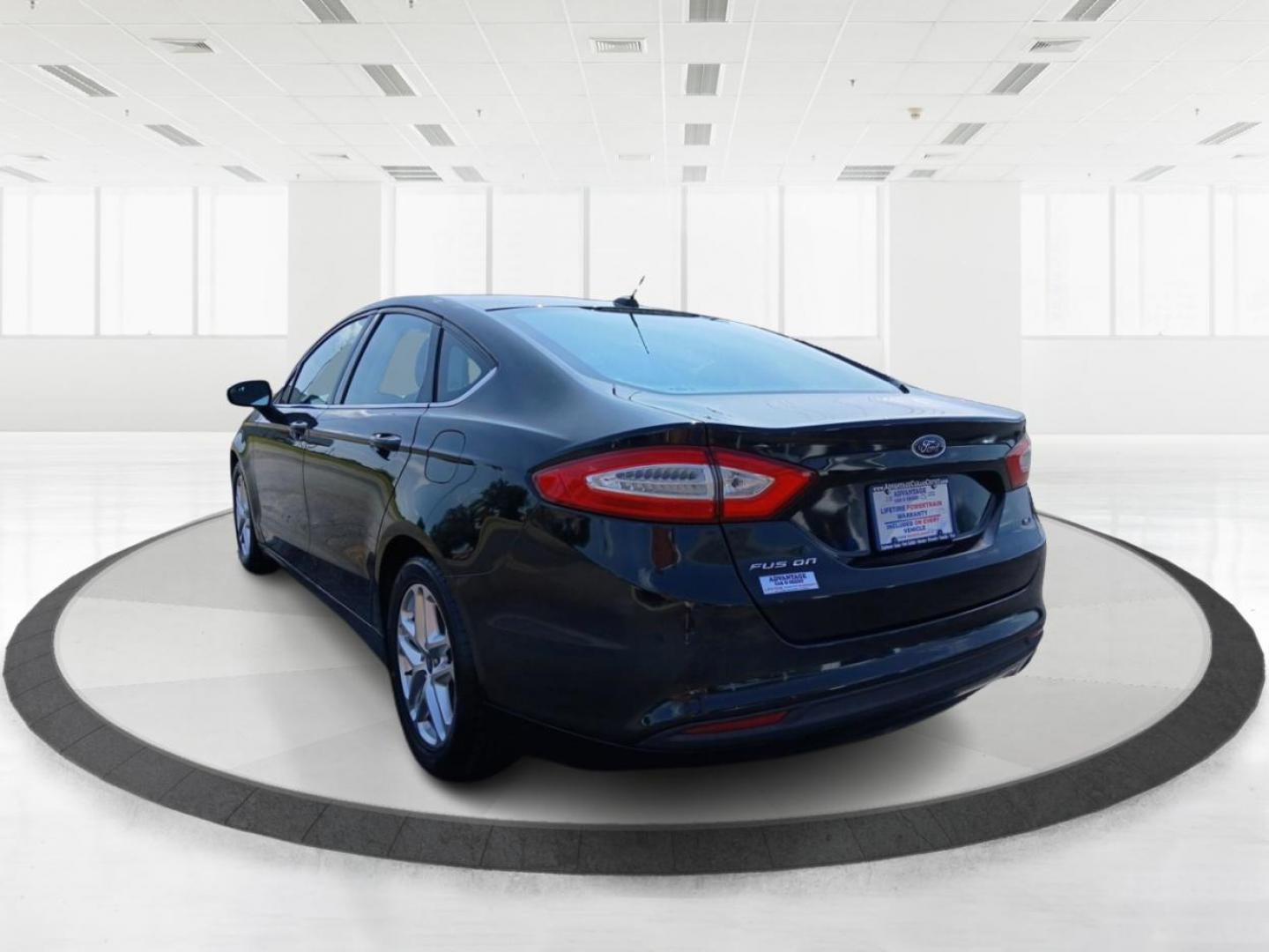 2013 Tuxedo Black Metallic Ford Fusion (3FA6P0H74DR) with an 2.5L L4 DOHC 16V engine, located at 401 Woodman Dr, Riverside, OH, 45431, (937) 908-9800, 39.763779, -84.122063 - Photo#4