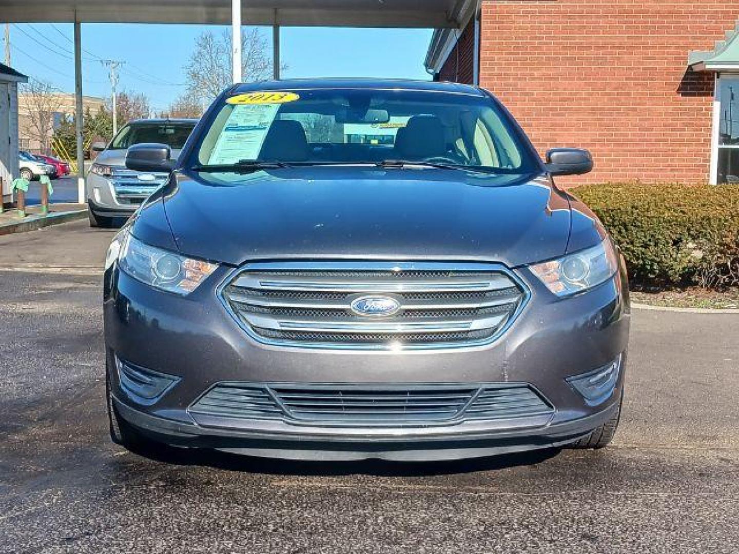 2013 Sterling Gray Metallic Ford Taurus SEL FWD (1FAHP2E81DG) with an 3.5L V6 DOHC 24V engine, 6-Speed Automatic transmission, located at 1099 N County Rd 25A, OH, 45373, (937) 908-9800, 40.057079, -84.212883 - Photo#1