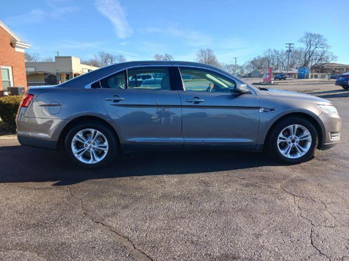 2013 Sterling Gray Metallic Ford Taurus SEL FWD (1FAHP2E81DG) with an 3.5L V6 DOHC 24V engine, 6-Speed Automatic transmission, located at 1099 N County Rd 25A, OH, 45373, (937) 908-9800, 40.057079, -84.212883 - Photo#4