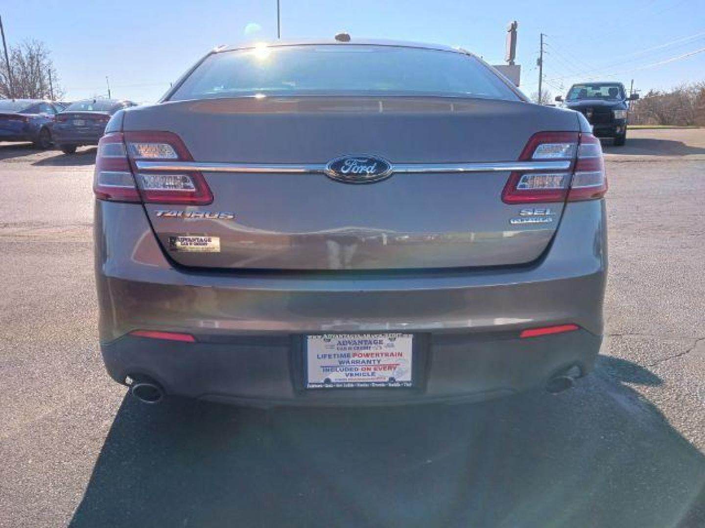 2013 Sterling Gray Metallic Ford Taurus SEL FWD (1FAHP2E81DG) with an 3.5L V6 DOHC 24V engine, 6-Speed Automatic transmission, located at 1099 N County Rd 25A, OH, 45373, (937) 908-9800, 40.057079, -84.212883 - Photo#5