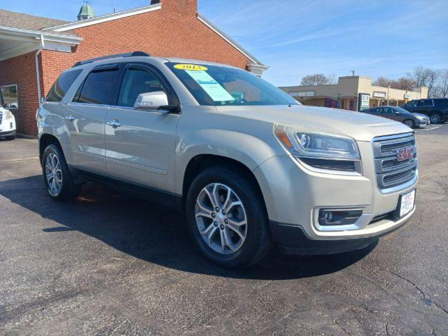 2013 Champagne Silver Metallic GMC Acadia SLT-1 AWD (1GKKVRKD0DJ) with an 3.6L V6 DOHC 24V engine, 6-Speed Automatic transmission, located at 401 Woodman Dr, Riverside, OH, 45431, (937) 908-9800, 39.763779, -84.122063 - Photo#0