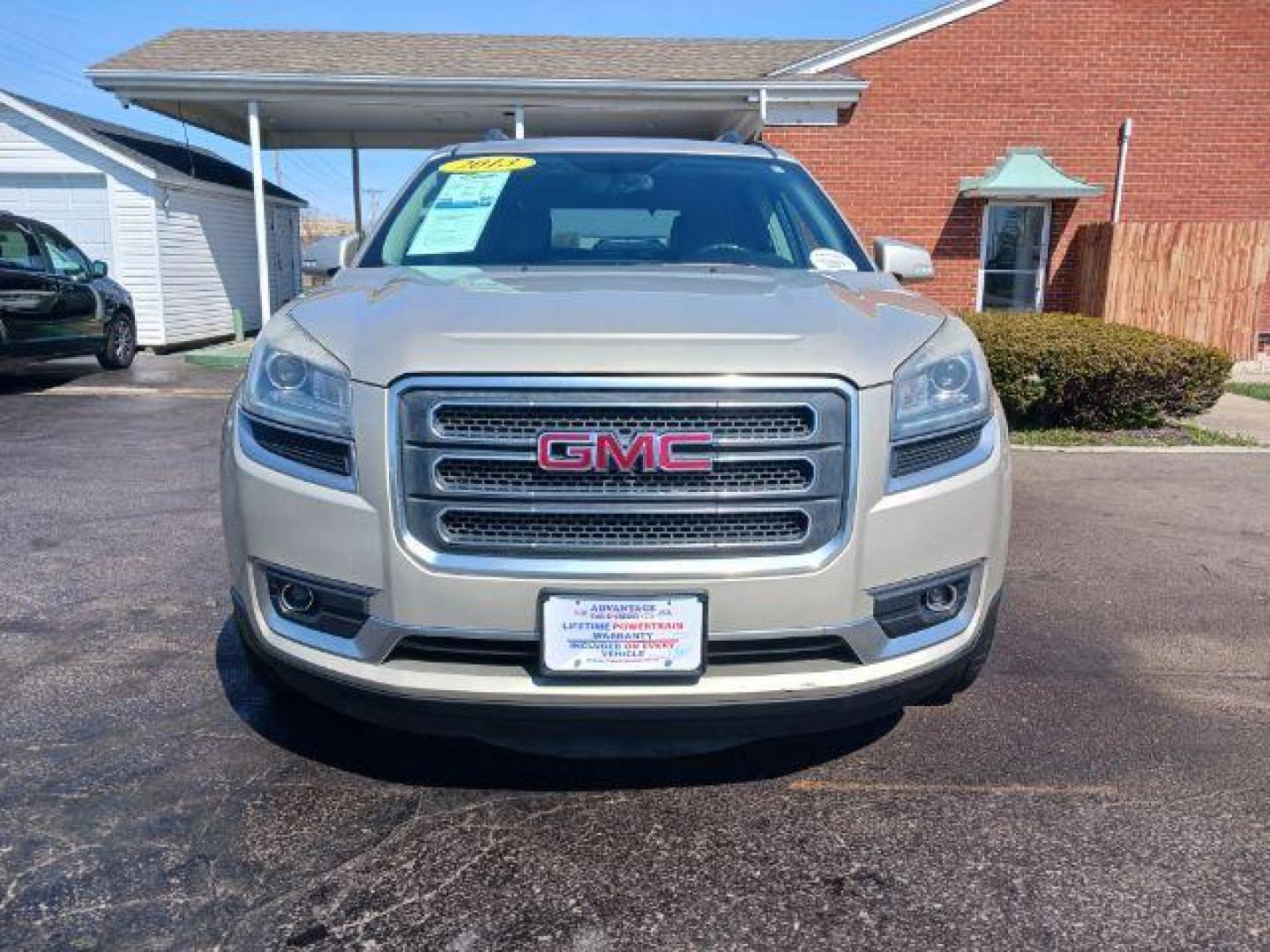 2013 Champagne Silver Metallic GMC Acadia SLT-1 AWD (1GKKVRKD0DJ) with an 3.6L V6 DOHC 24V engine, 6-Speed Automatic transmission, located at 401 Woodman Dr, Riverside, OH, 45431, (937) 908-9800, 39.763779, -84.122063 - Photo#1