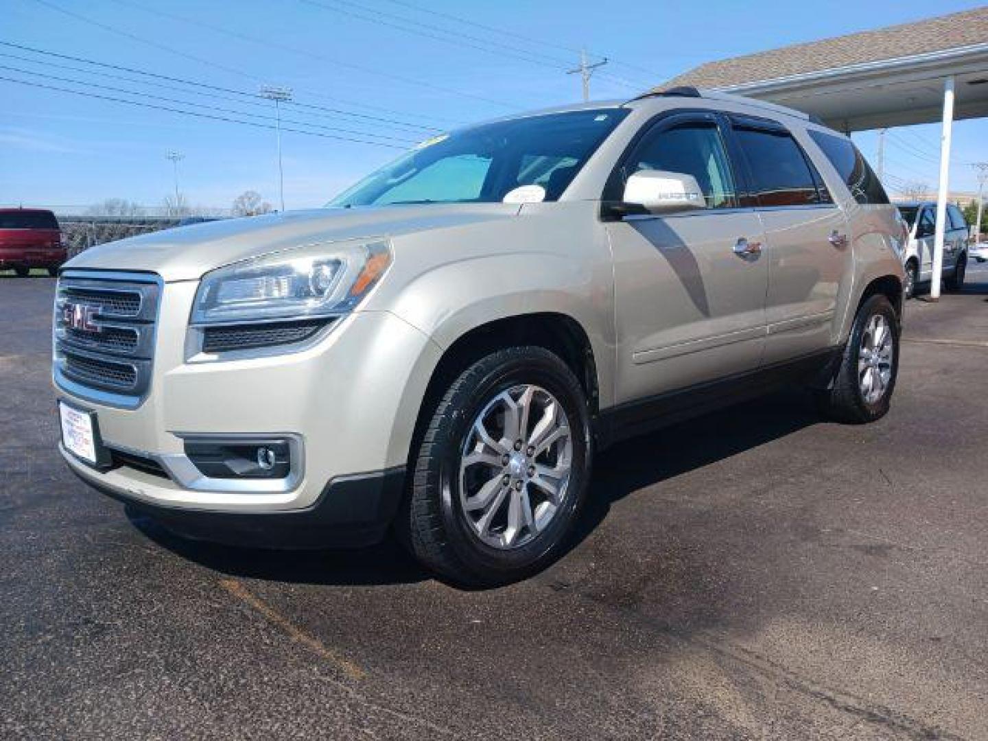 2013 Champagne Silver Metallic GMC Acadia SLT-1 AWD (1GKKVRKD0DJ) with an 3.6L V6 DOHC 24V engine, 6-Speed Automatic transmission, located at 401 Woodman Dr, Riverside, OH, 45431, (937) 908-9800, 39.763779, -84.122063 - Photo#2